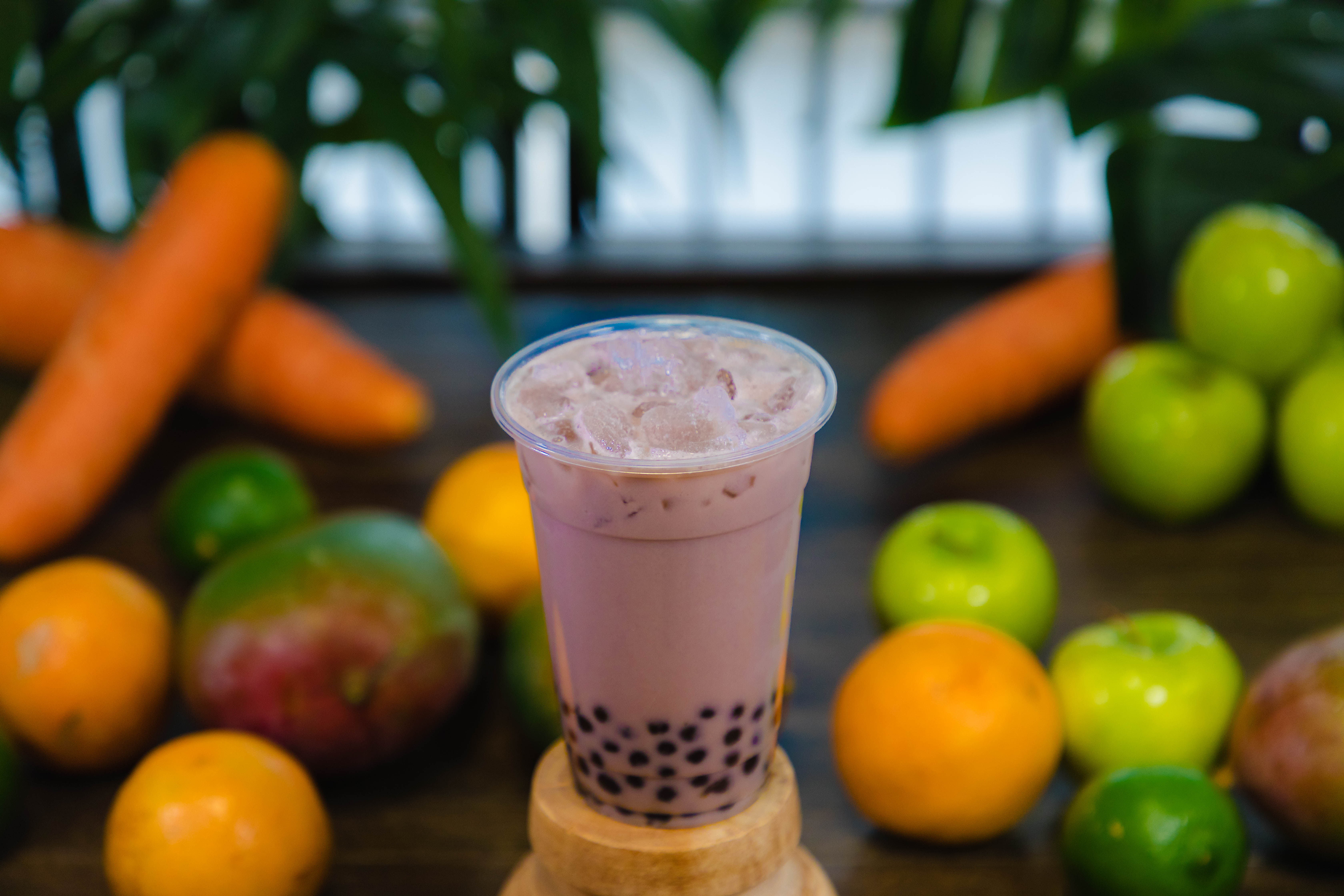 Order Taro Milk Tea food online from Chin Brothers Restaurant store, Indianapolis on bringmethat.com