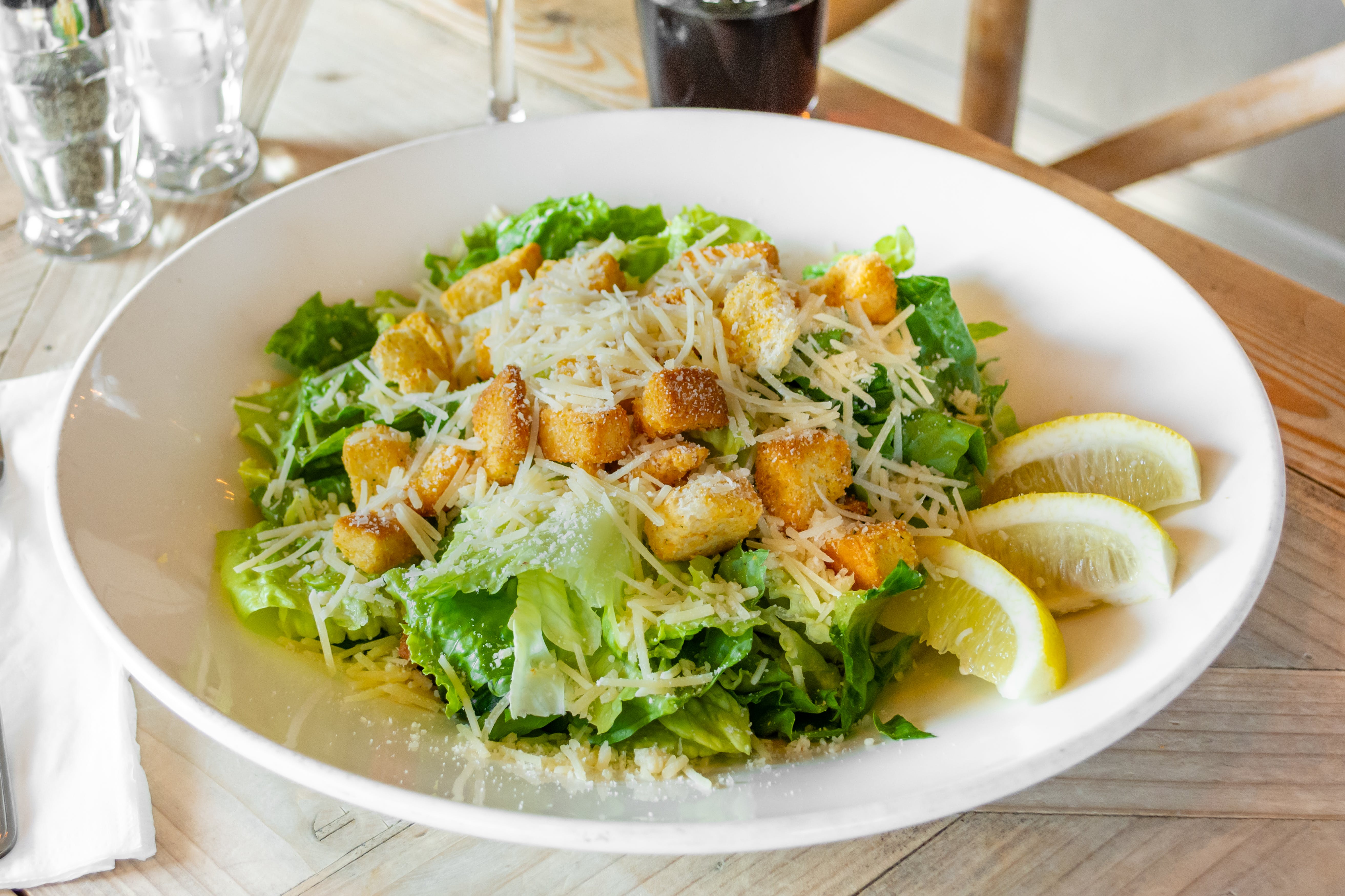 Order Caesar Salad - Salad food online from Acropolis Pizza & Pasta store, Everett on bringmethat.com
