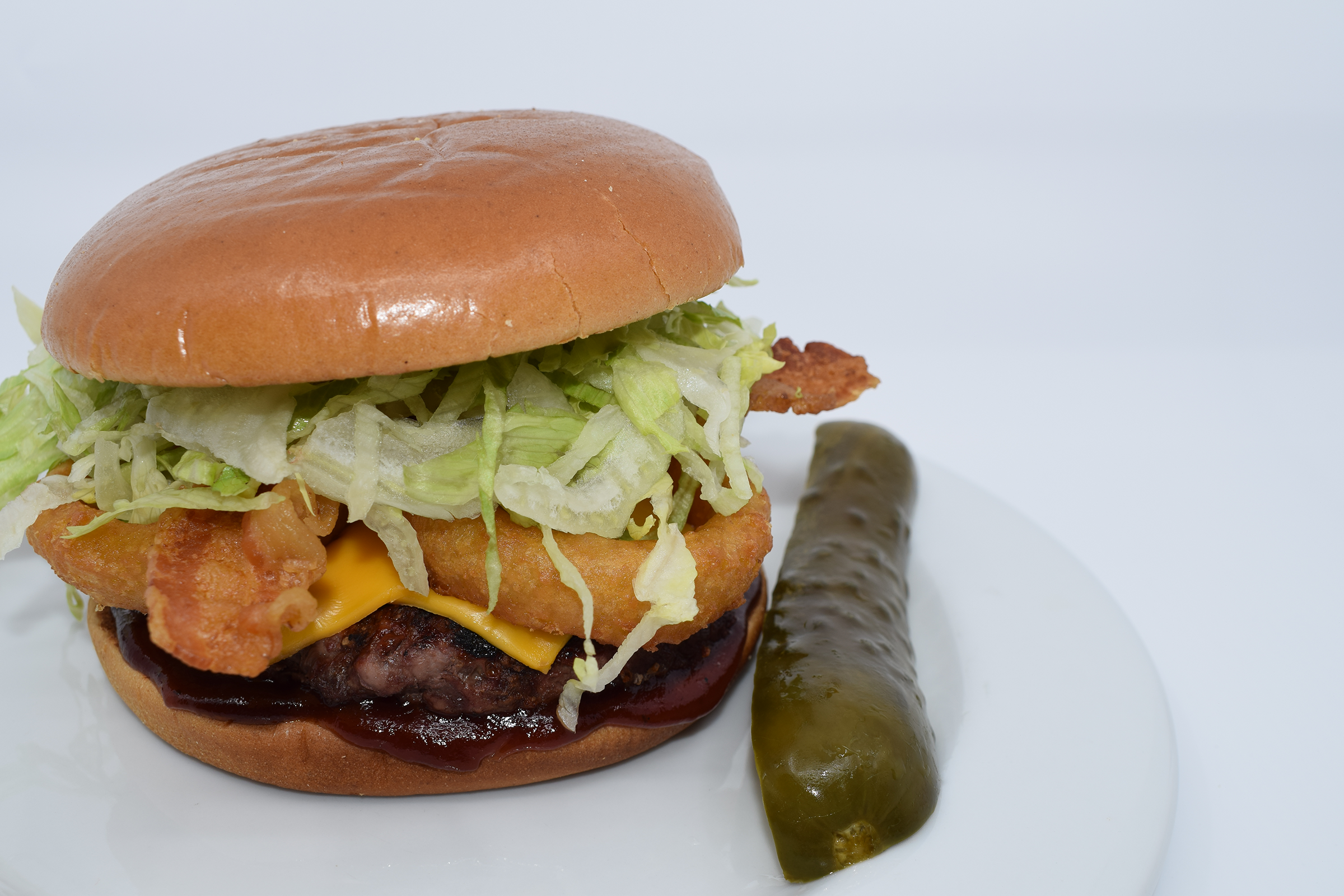 Order THE SALOON BURGER food online from Mad House Comedy Club store, San Diego on bringmethat.com