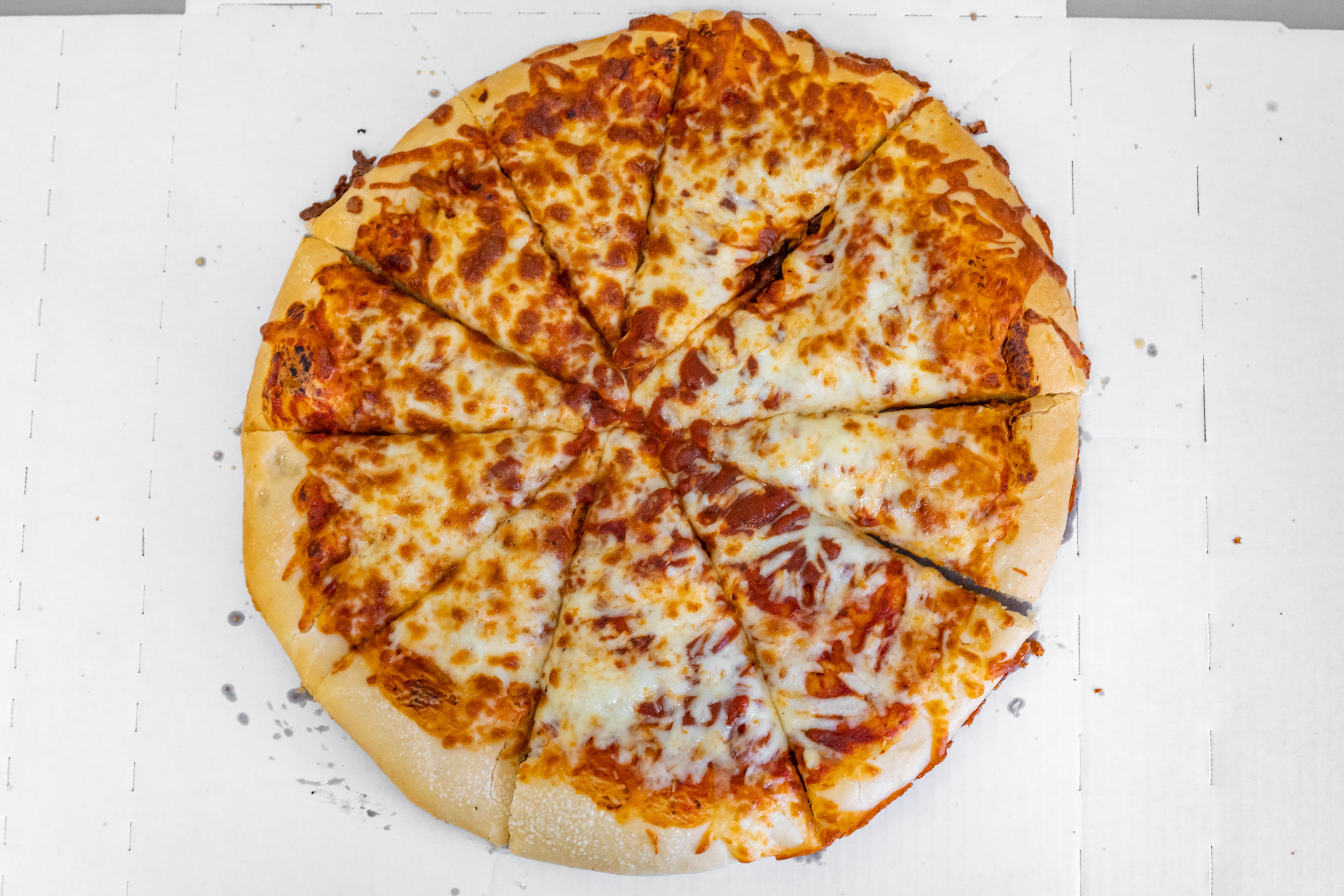Order Pan Cheese Pizza - 7'' (4 Slices) food online from Pizzas By Marchelloni store, Joliet on bringmethat.com