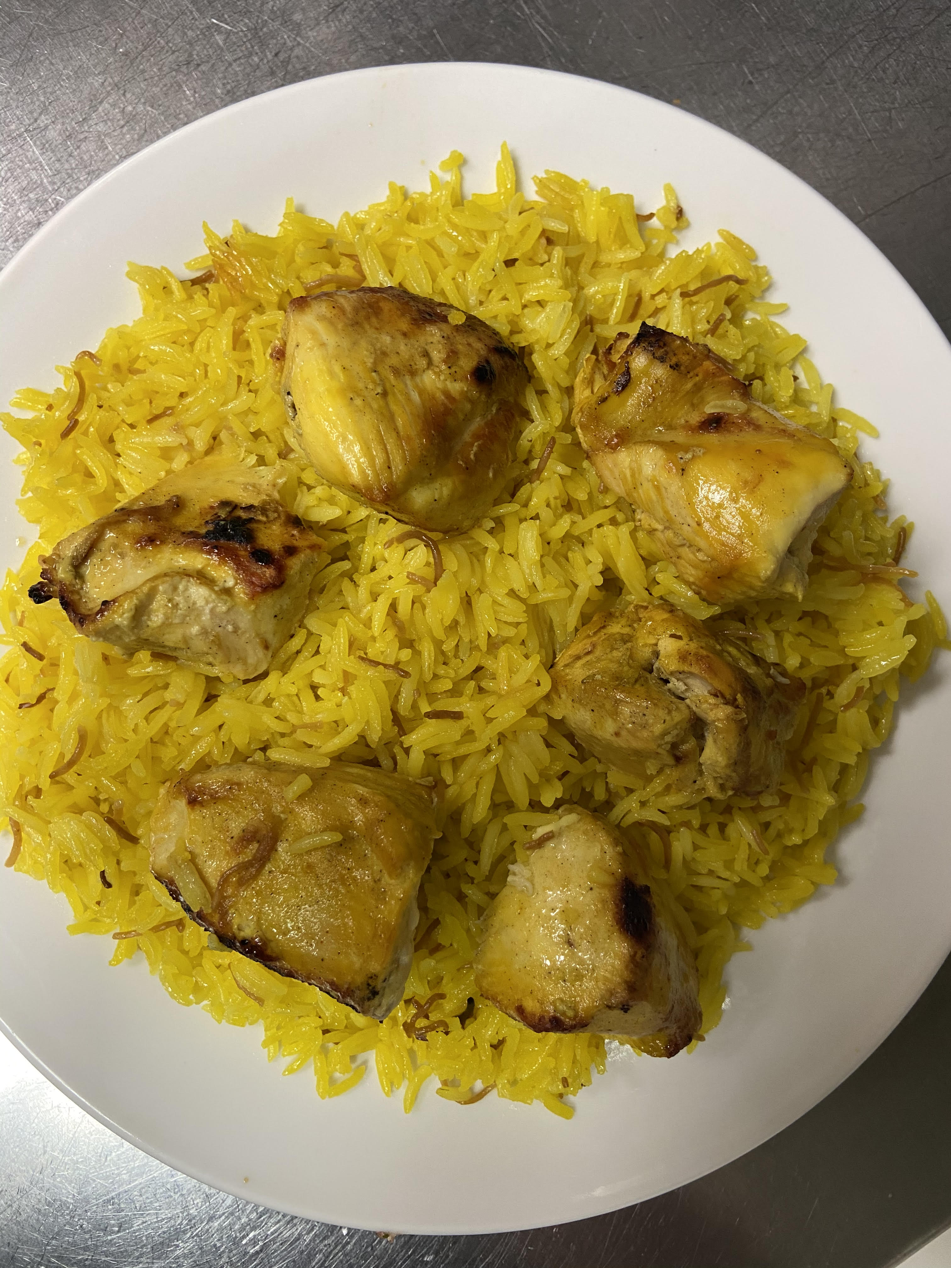 Order Yellow Rice food online from Princess Mediterranean Grill store, Commerce Charter Township on bringmethat.com