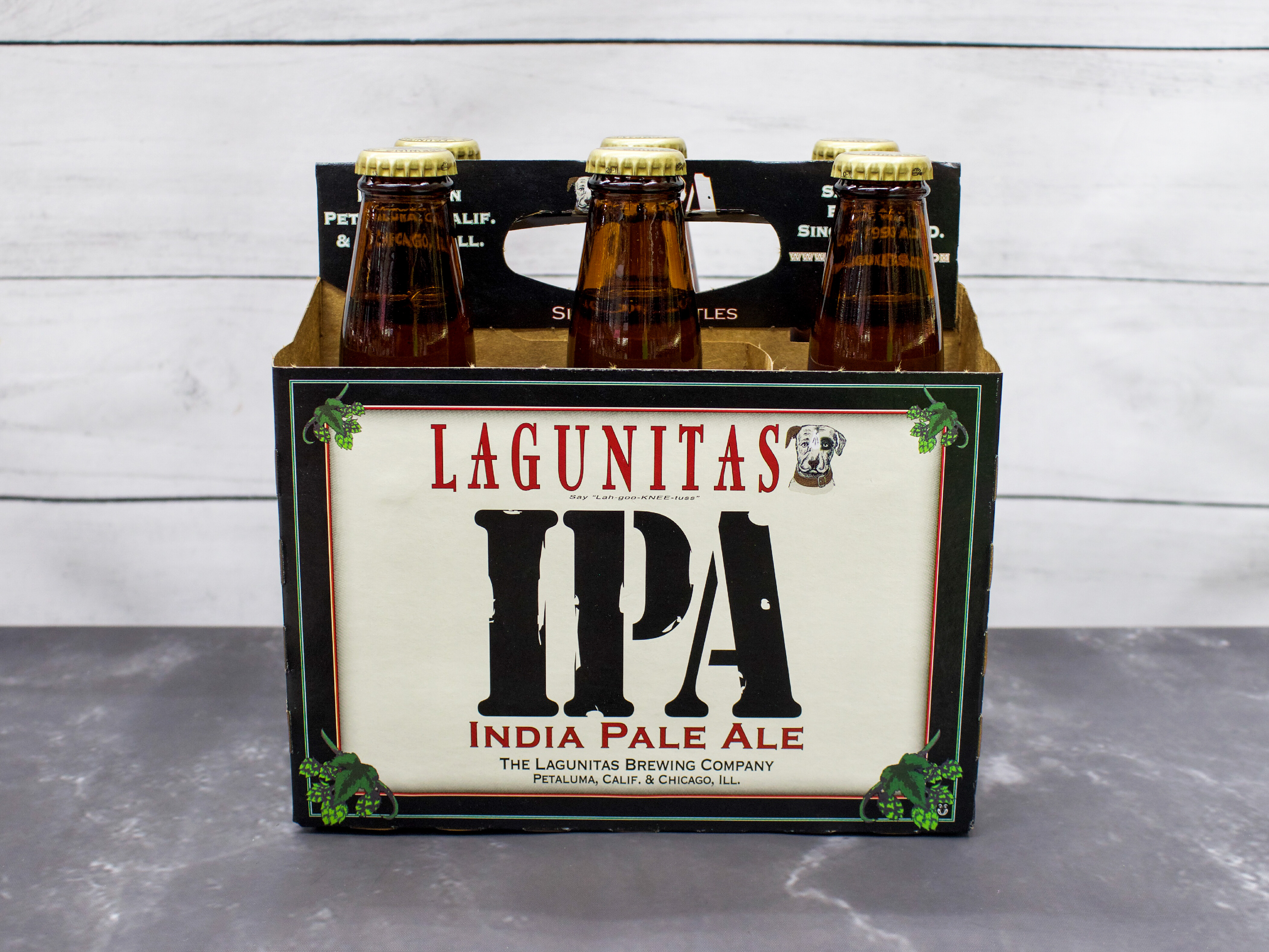 Order 12 oz. Lagunitas IPA, 6-Pack Bottle 6.2% abv food online from Bailey Plaza Liquors store, Mountain View on bringmethat.com