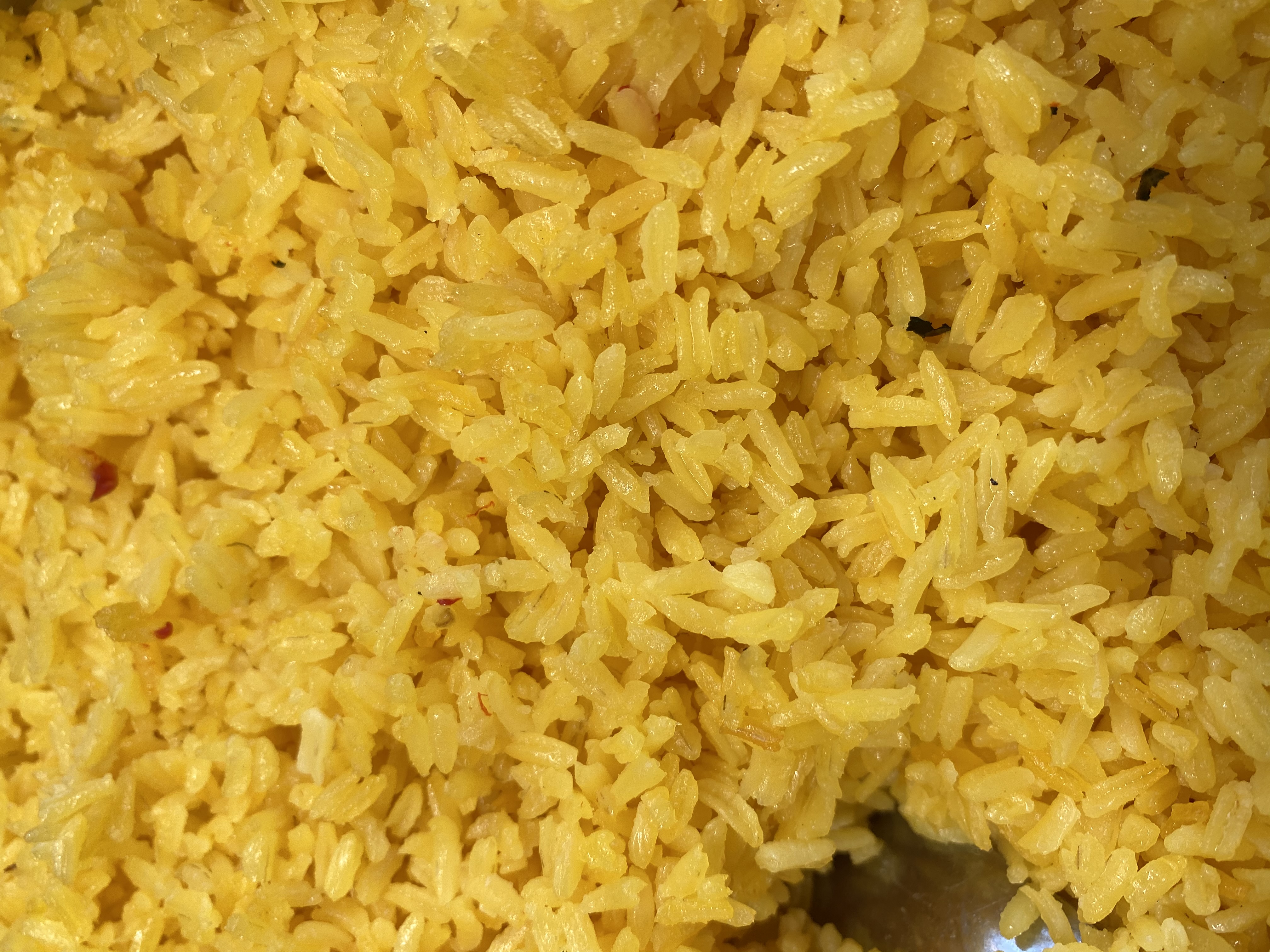 Order Yellow Rice food online from Los Latinos Deli store, Long Beach on bringmethat.com