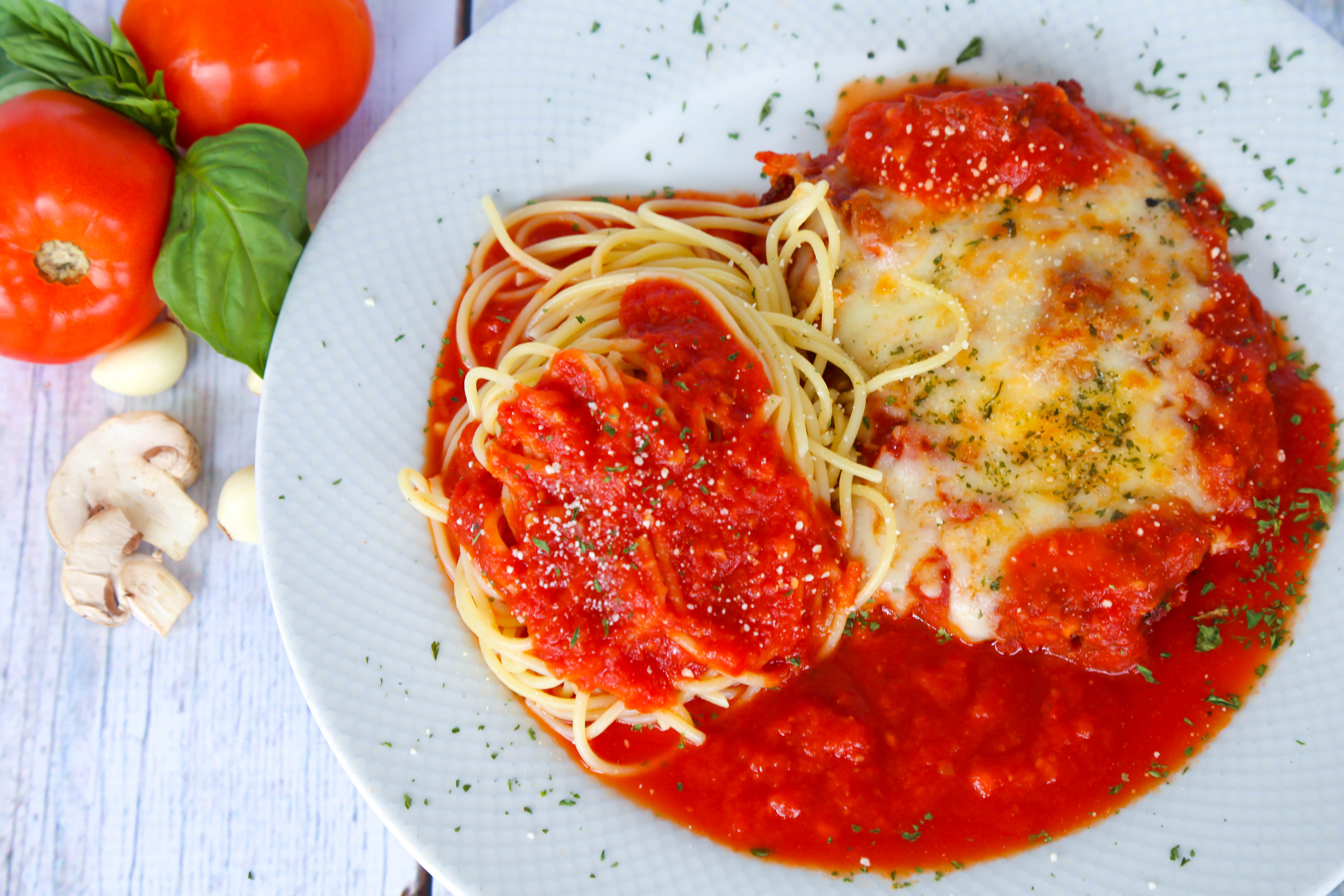 Order Veal Parmigiana food online from Vito's Gourmet Pizza store, Pompano Beach on bringmethat.com