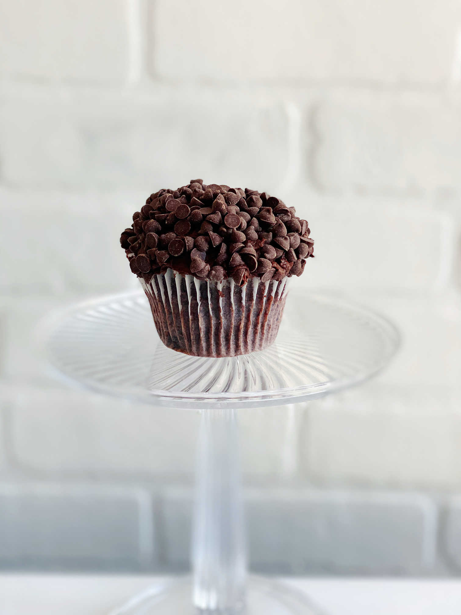 Order Triple Chocolate Cupcake food online from Sugar Blossom Bake Shop store, San Clemente on bringmethat.com