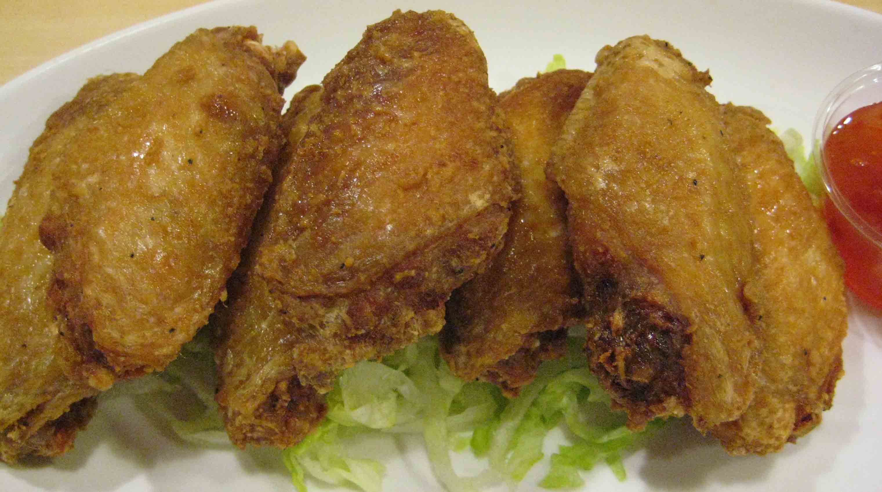 Order Garlic Chicken Wings 蒜香雞翼 food online from Street Food Cafe store, San Mateo on bringmethat.com