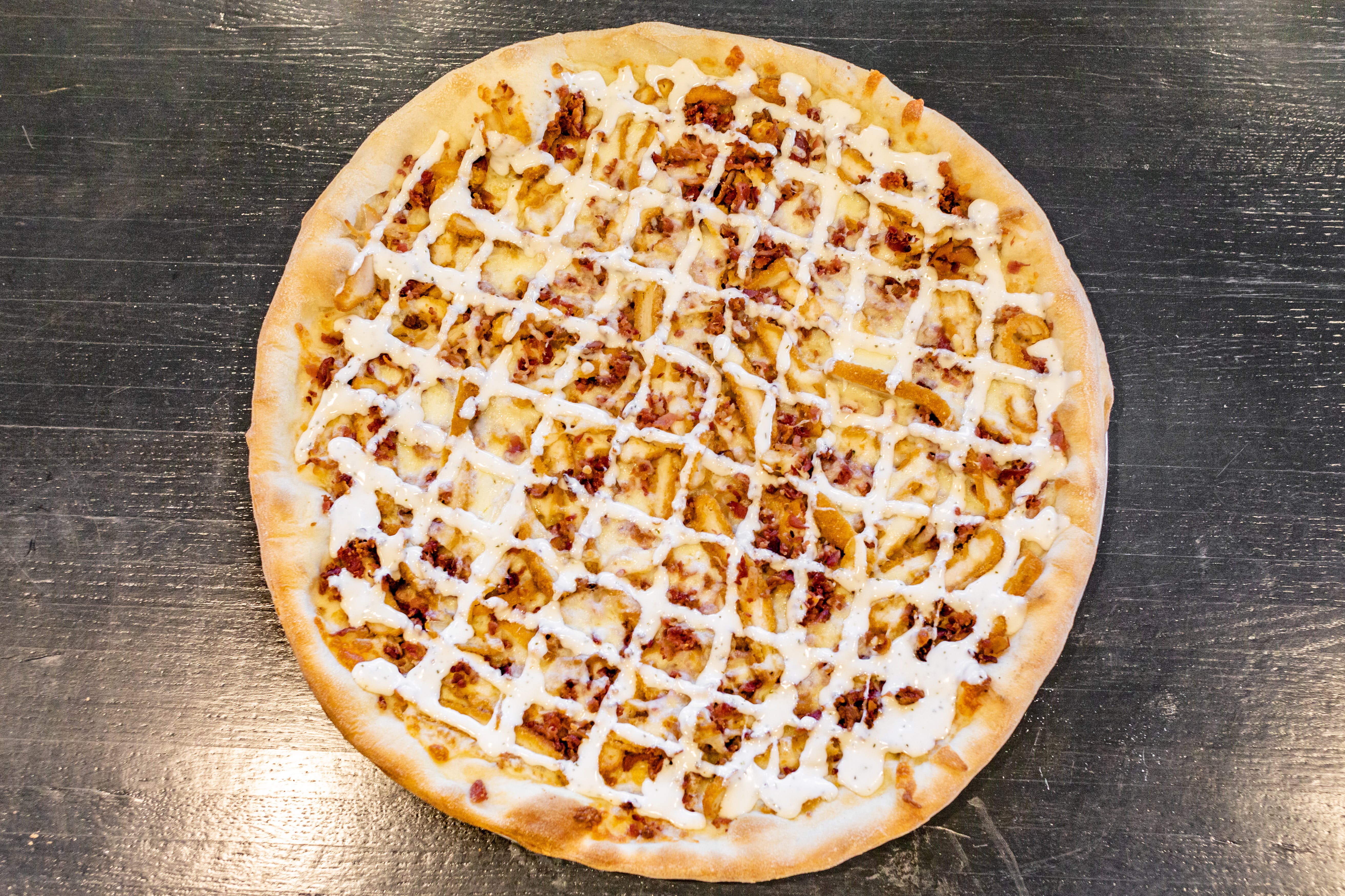 Order Chicken Bacon & Ranch Pizza - Medium 14'' food online from Joey's Pizza store, Milford on bringmethat.com