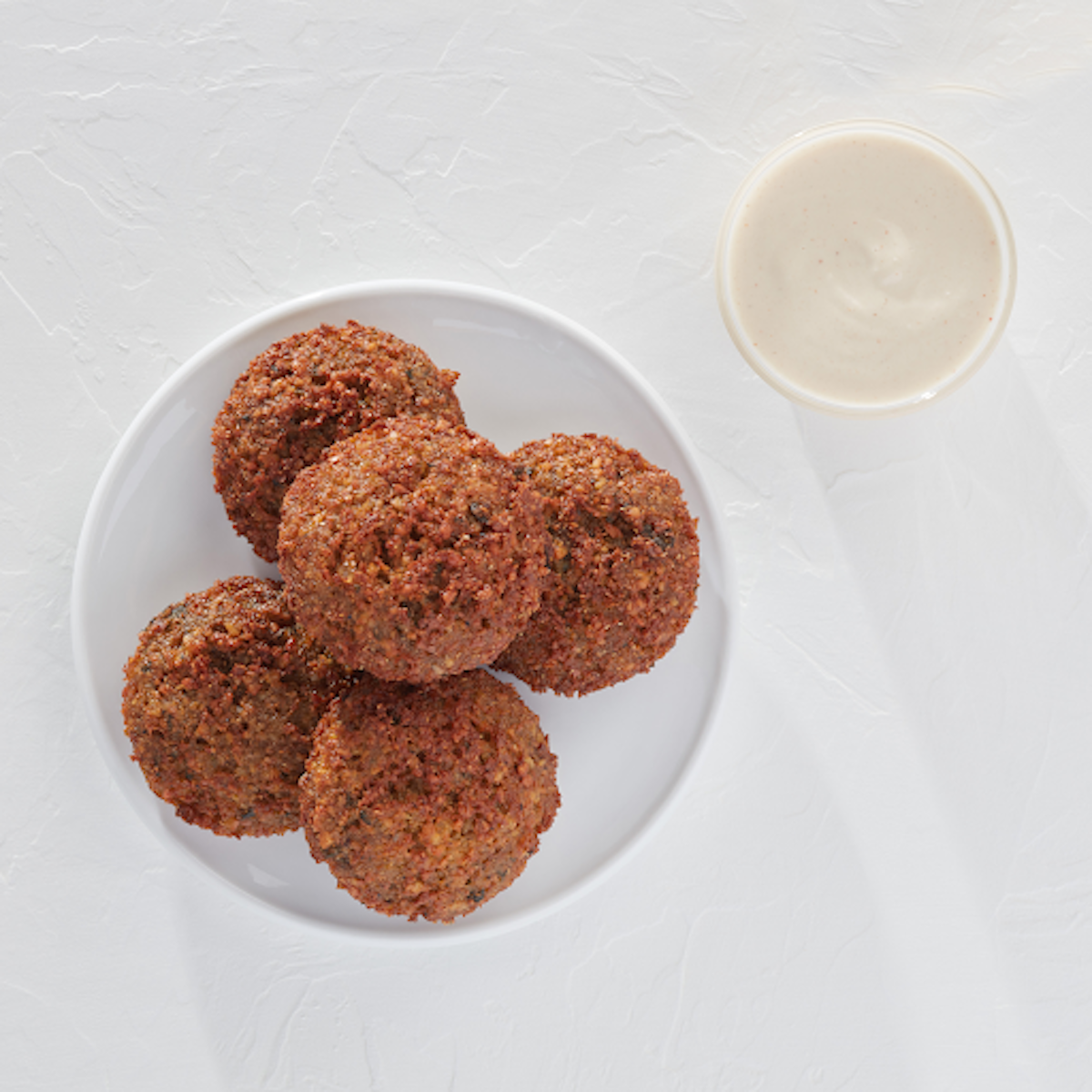 Order Five Falafels with Tahini Sauce food online from Pita Chip store, Philadelphia on bringmethat.com
