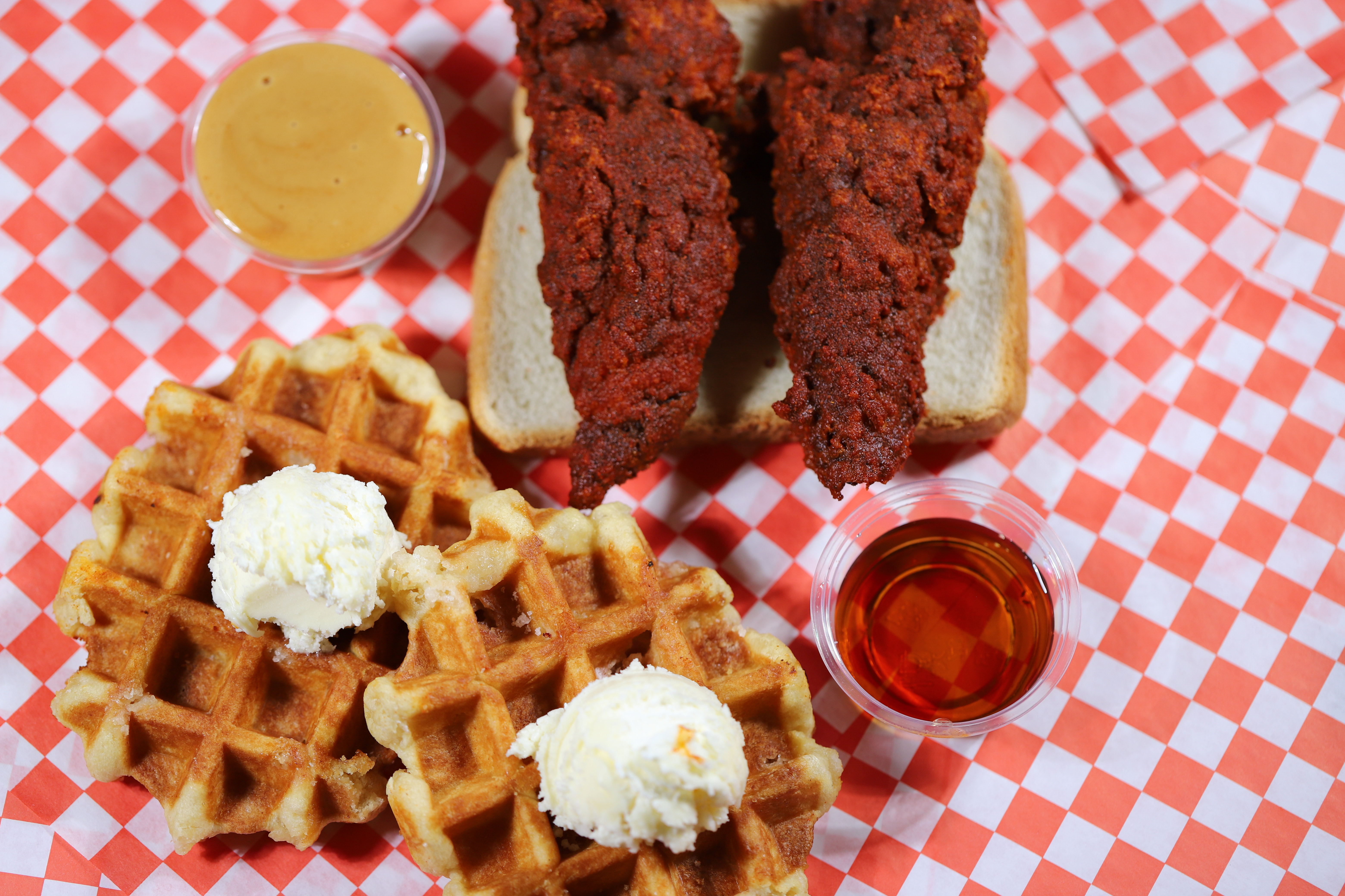Order 2 Waffles + 2 Strips food online from Al Hot Chicken store, Los Angeles on bringmethat.com