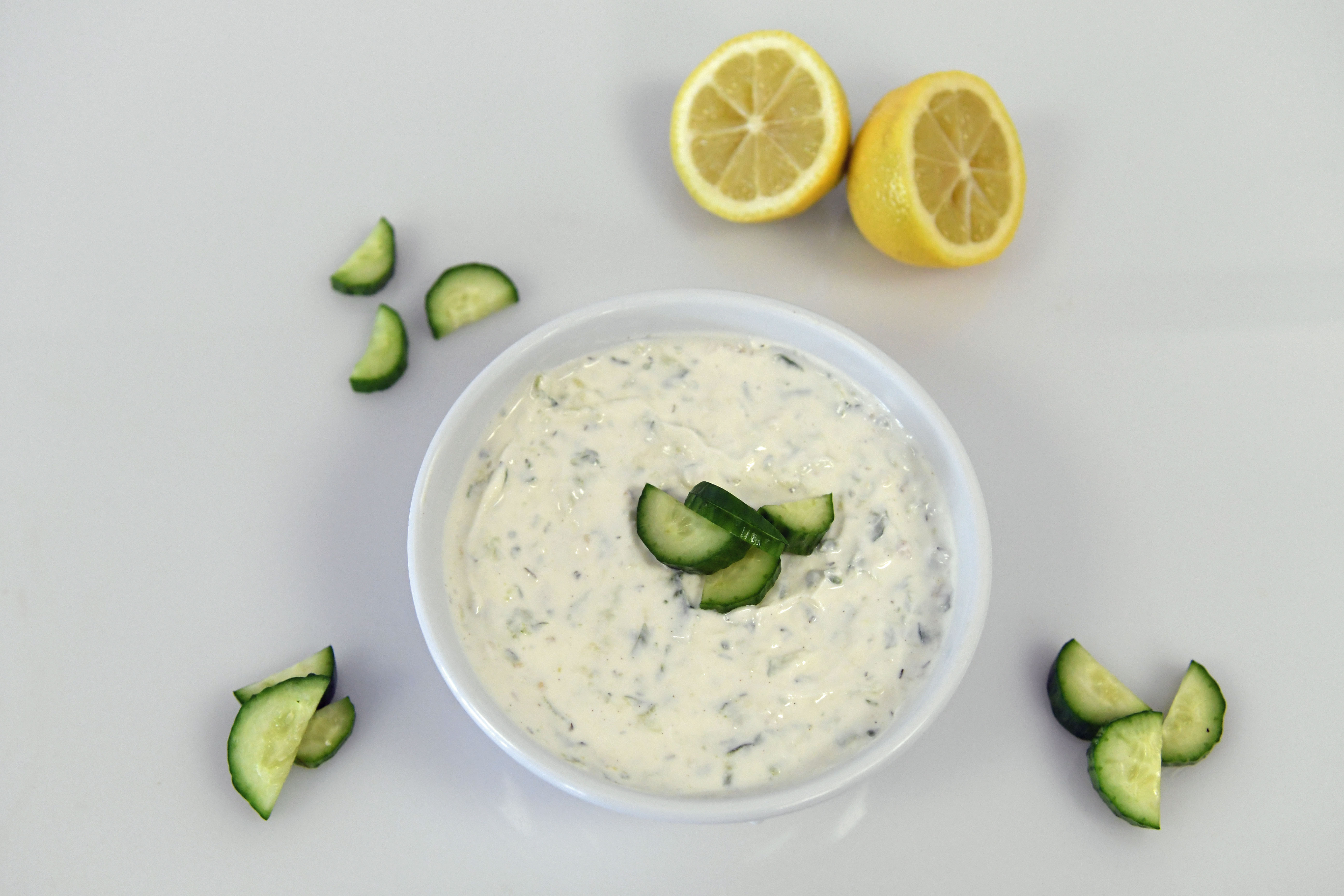 Order Extra Tzatziki food online from Your Greek Cousin store, West Palm Beach on bringmethat.com