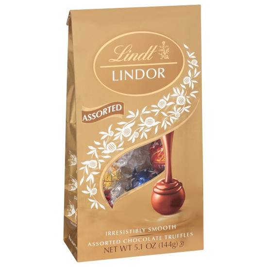Order Lindt LINDOR Assorted Chocolate Truffles, Chocolate with Smooth, Melting Truffle Center, 5.1 oz. Bag food online from CVS store, LIMA on bringmethat.com