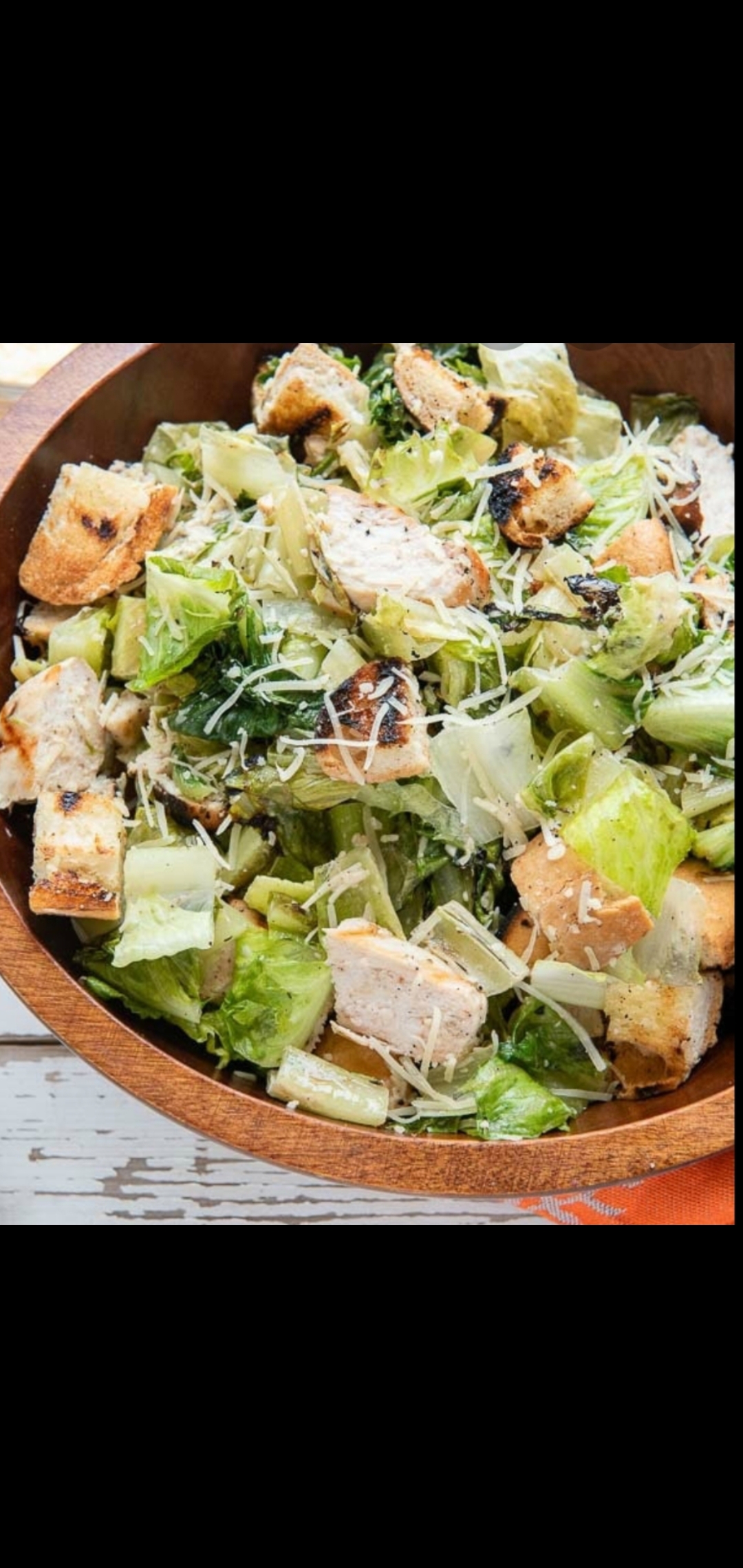 Order Chicken Caesar Salad Bowl (grilled chicken romaine lettuce parmesan cheese croutons & Caesar dressing) food online from American Gourmet Foods Deli store, New York on bringmethat.com