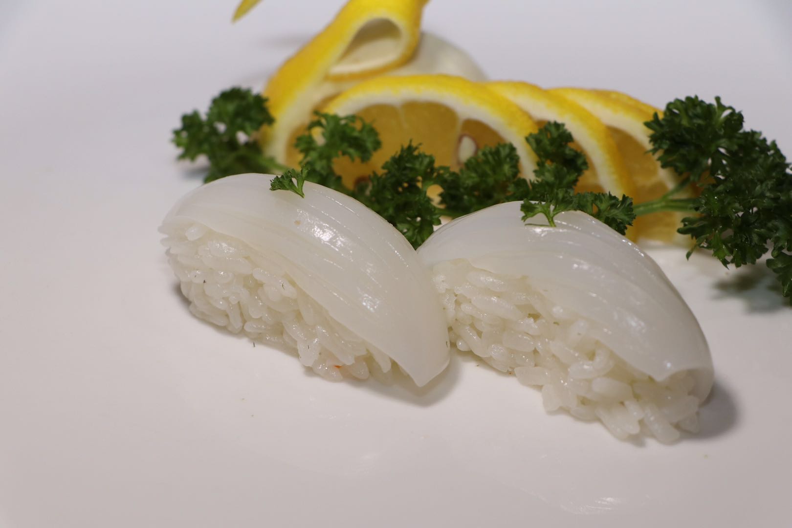 Order Squid Sushi food online from Osaka Sushi & Grill store, Addison on bringmethat.com