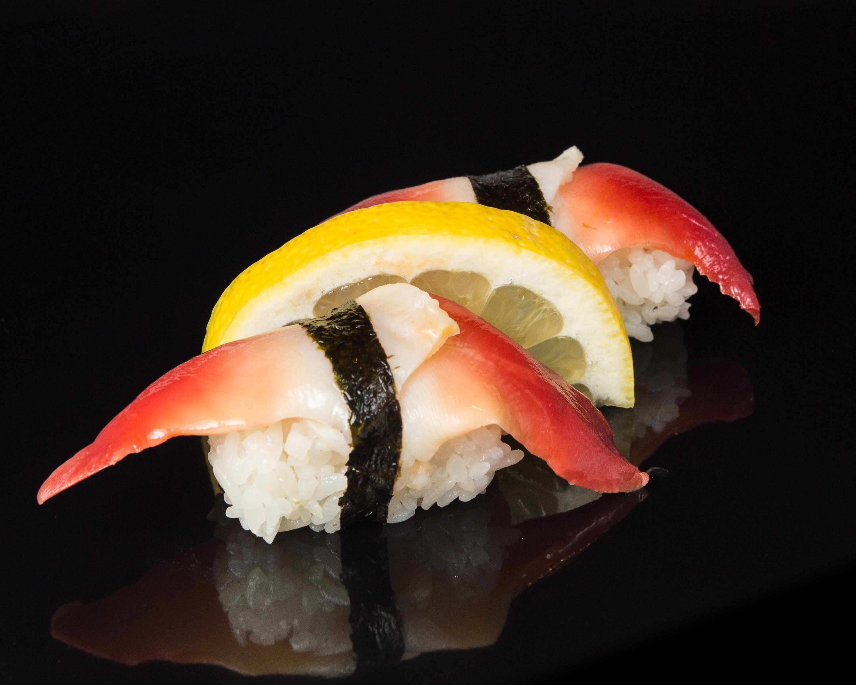 Order 2 Pieces Red Clam food online from Sushi Sakura Express store, Houston on bringmethat.com