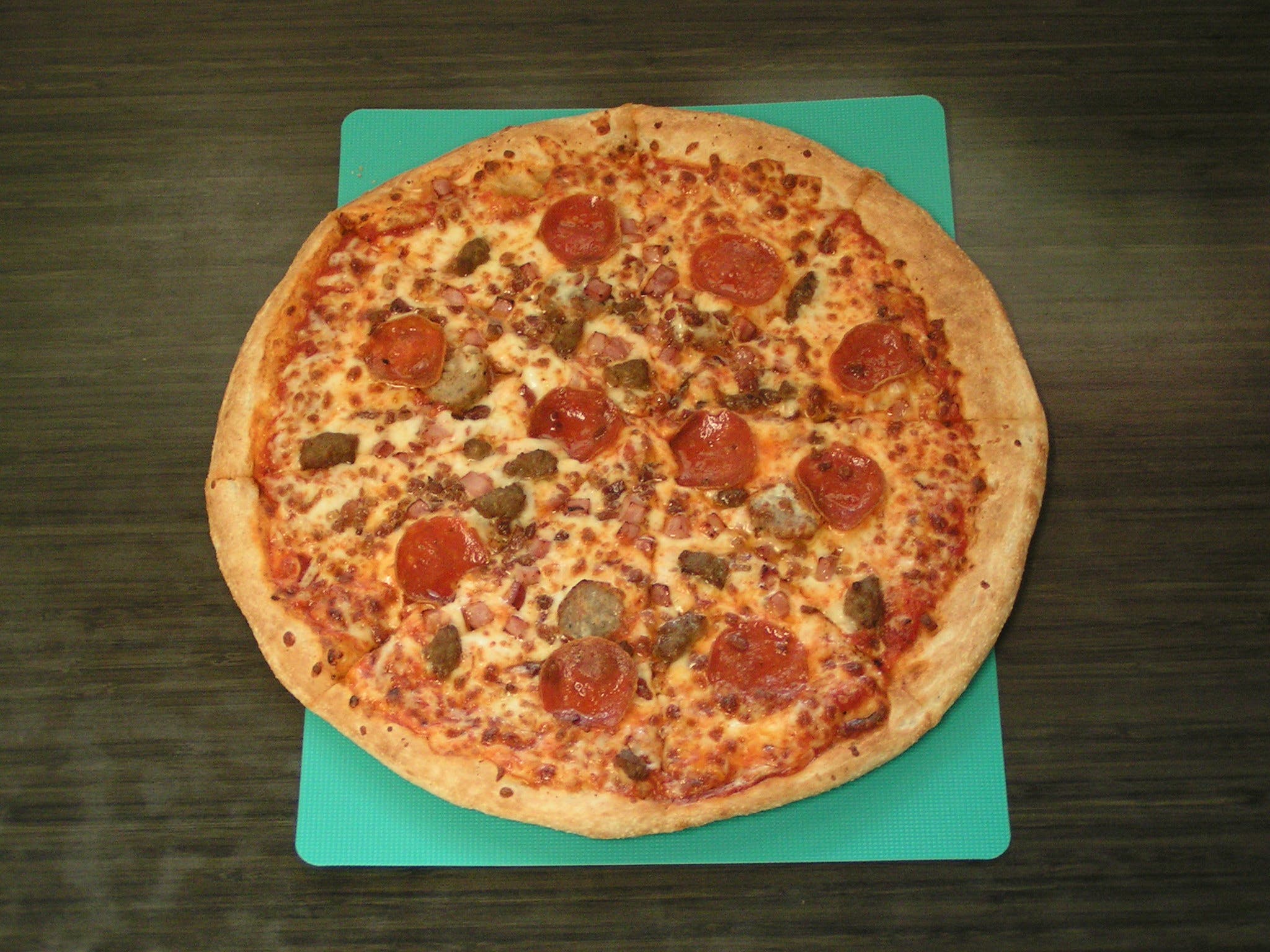 Order MEAT - 8"  PERSONAL food online from Pepperinos Pizza store, Lewistown on bringmethat.com