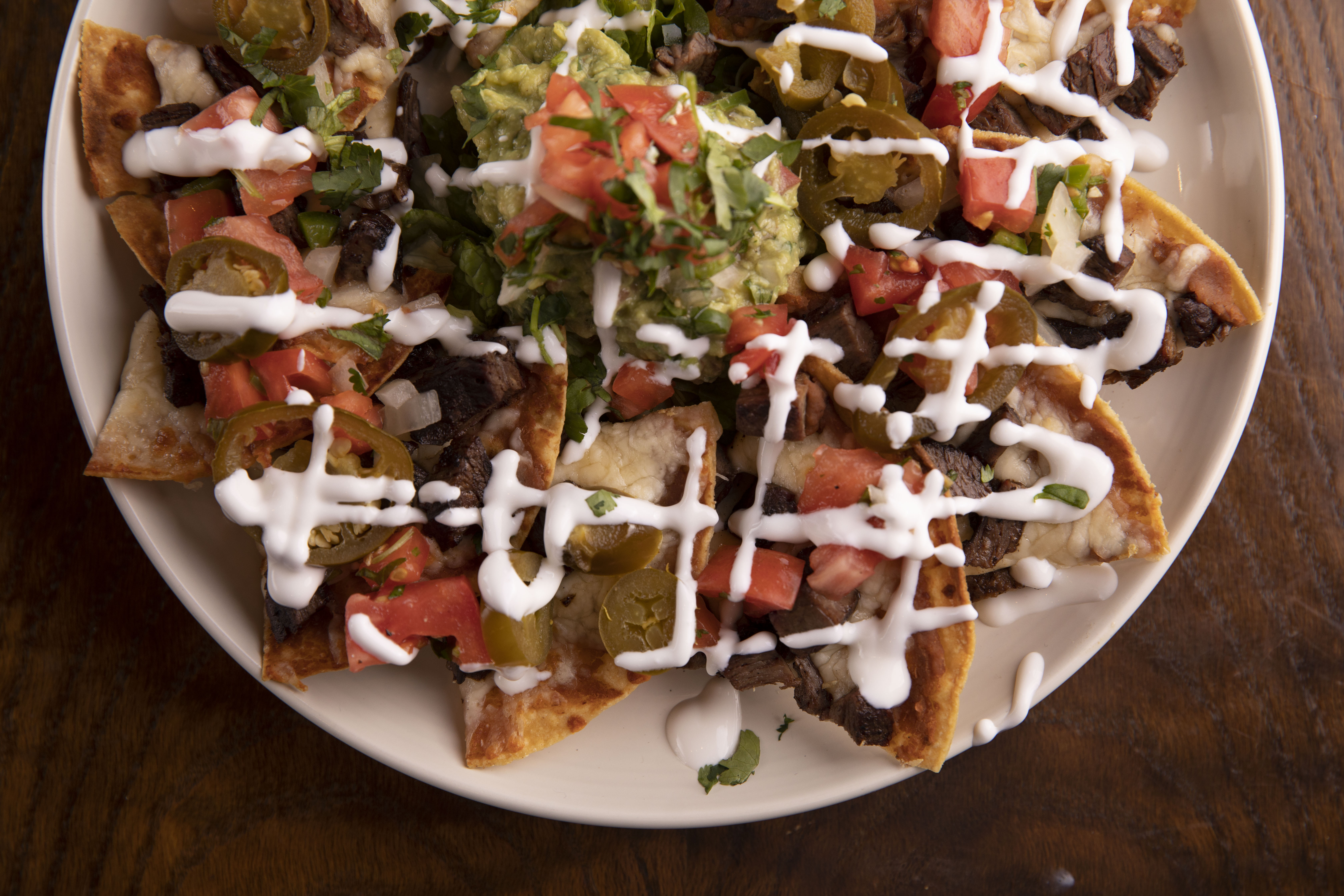 Order Nachos food online from Flagship Tavern store, Chicago on bringmethat.com