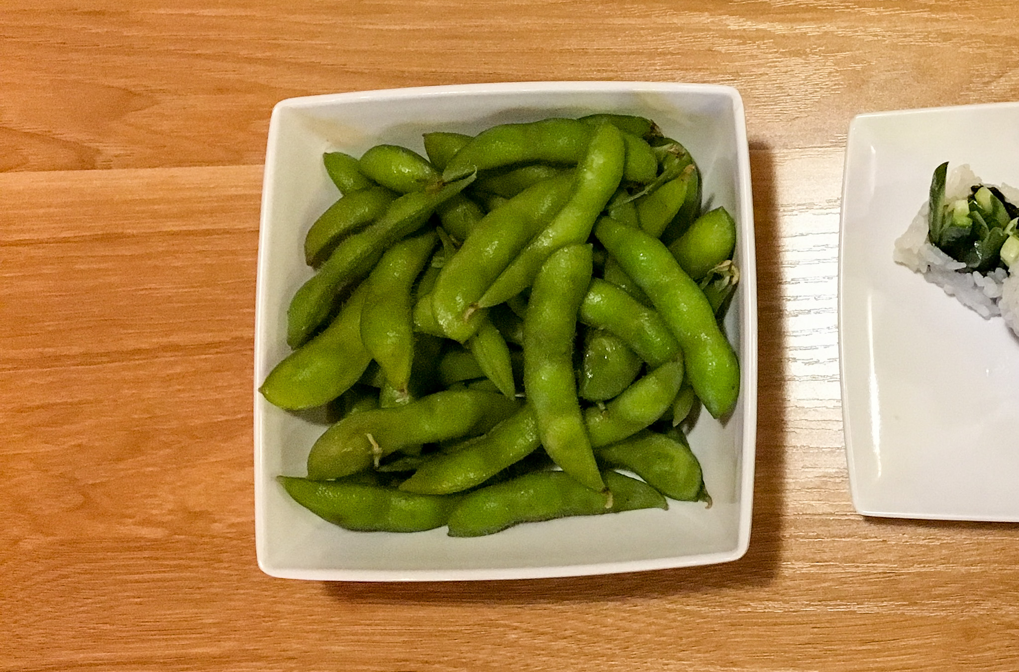 Order Edamame food online from Rollstop Sushi store, San Pedro on bringmethat.com