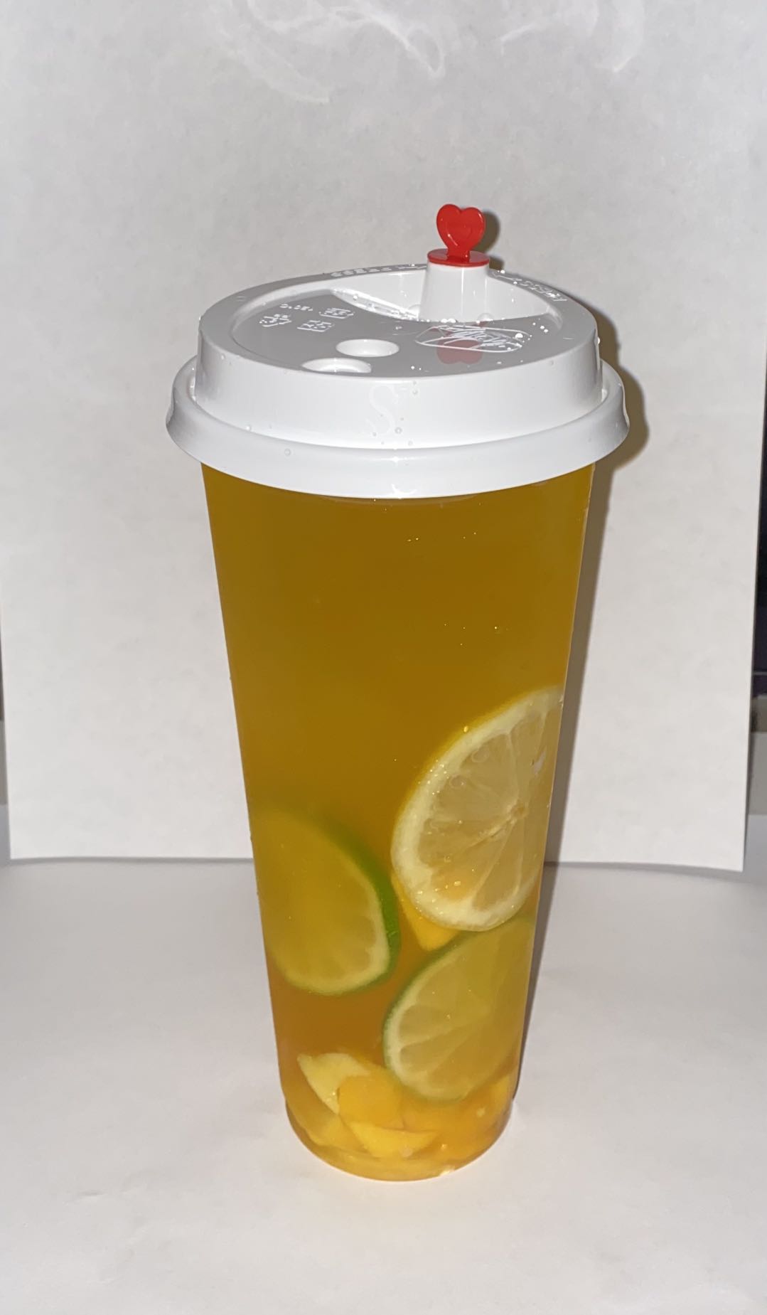 Order Peach Oolong Tea food online from Domoishi - Pembroke - Constitution Dr. store, Virginia Beach on bringmethat.com