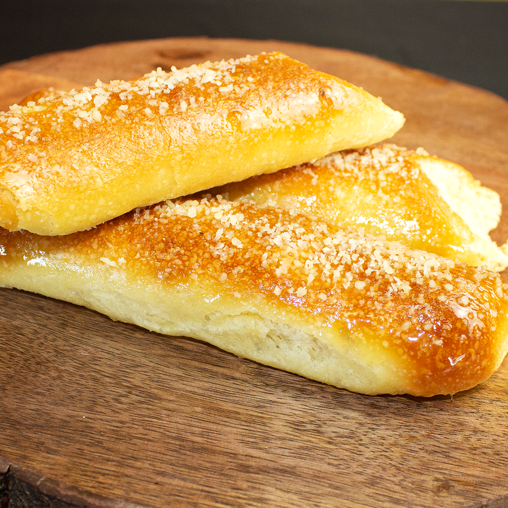 Order Single Breadstick food online from Wings Empire store, San Diego on bringmethat.com