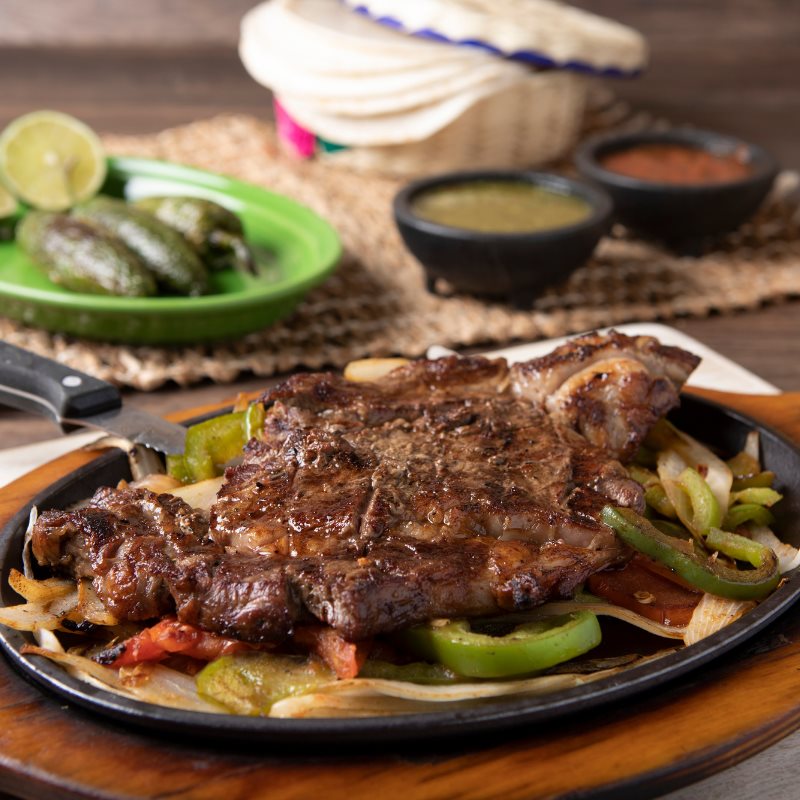 Order Steak Ranchero food online from La Fiesta Mexican Restaurant store, High Point on bringmethat.com