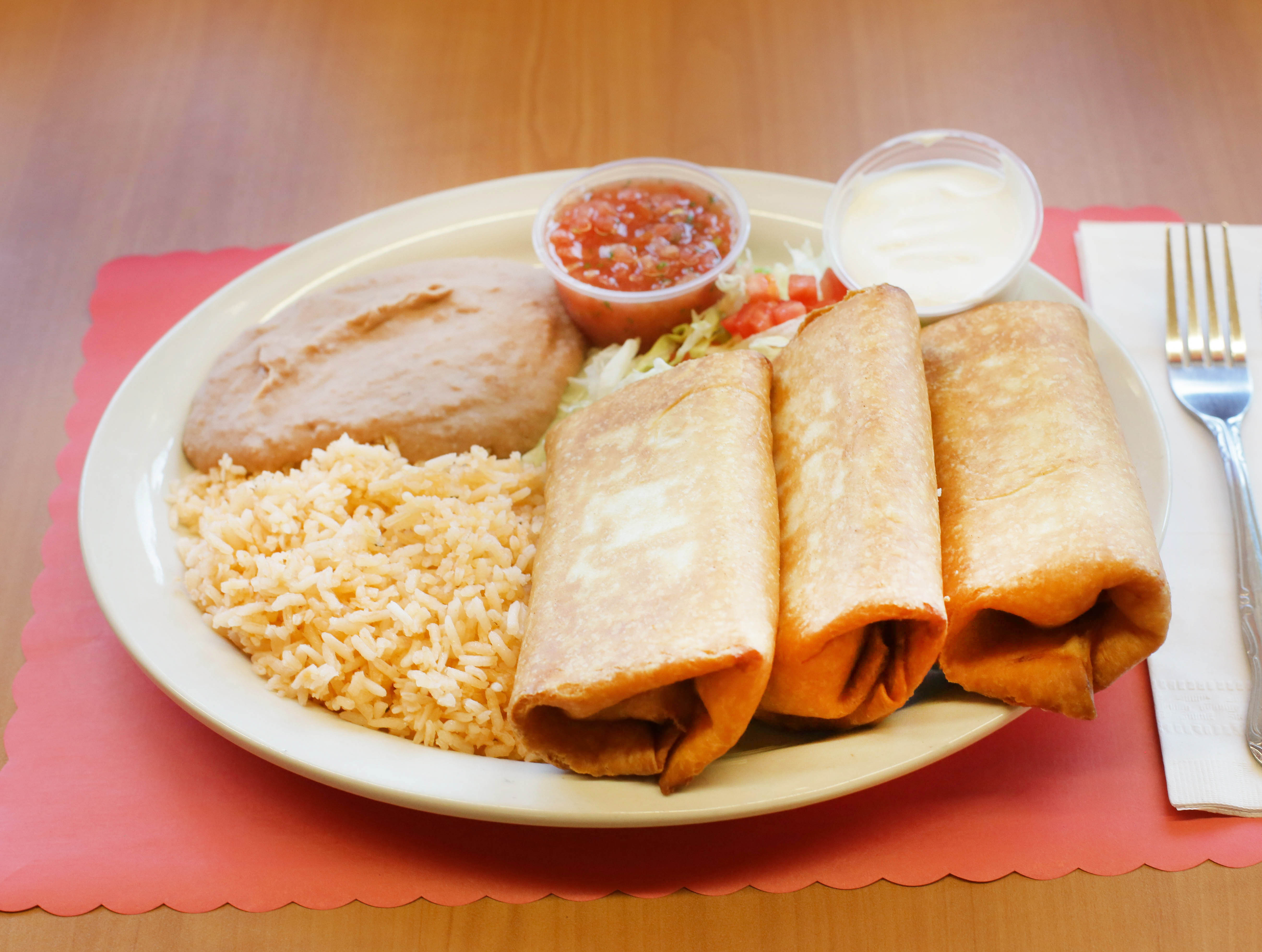 Order 3 Chicken Chimichangas food online from Mara Grill store, Milwaukee on bringmethat.com