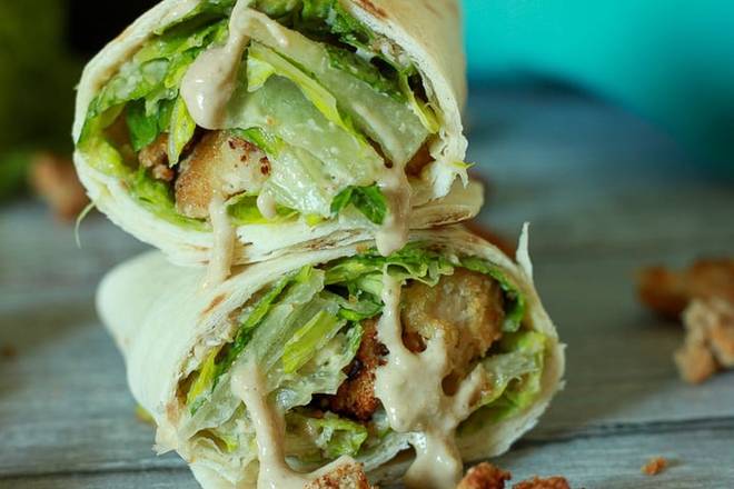 Order Caesar Wrap food online from The Kitchen By Be Well store, Beverly Hills on bringmethat.com