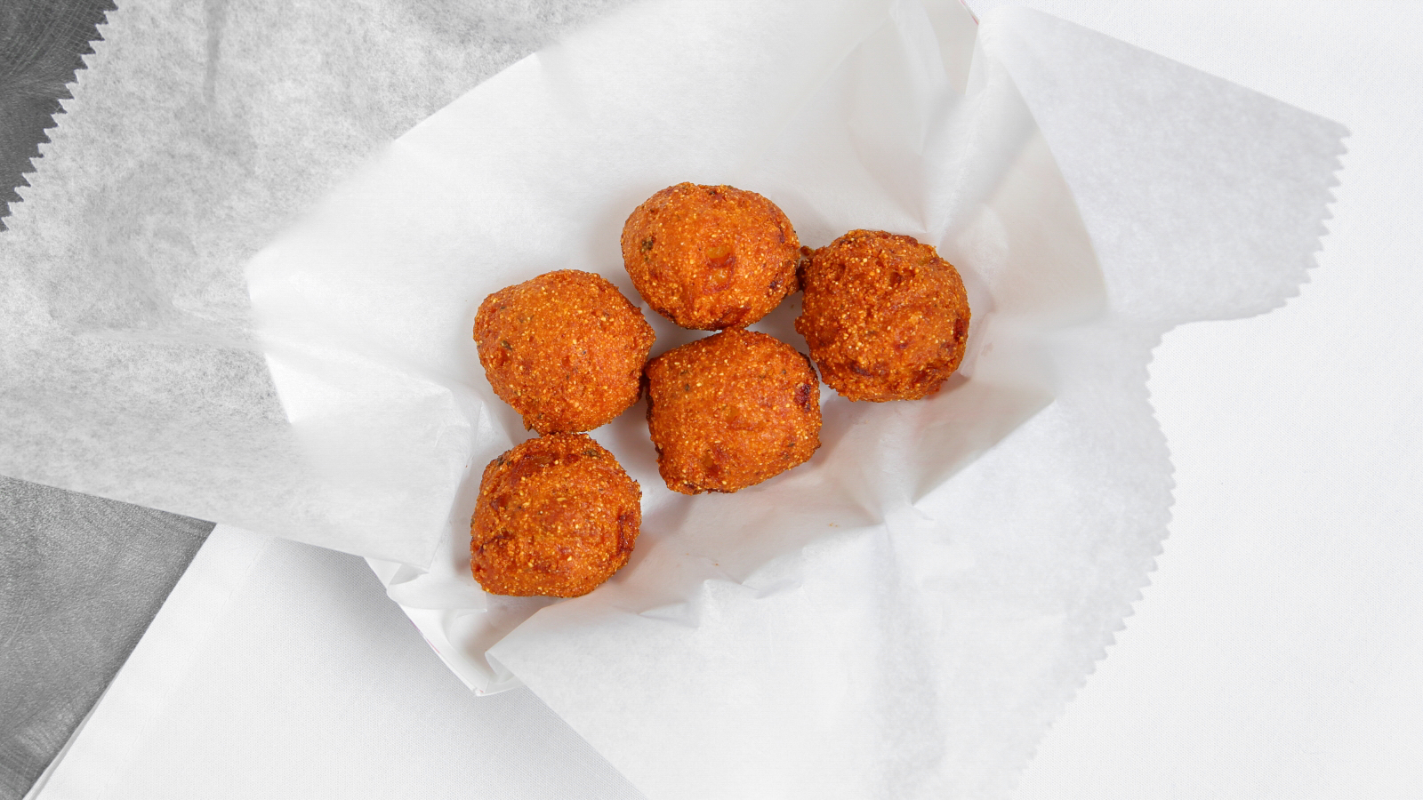 Order Hush Puppies food online from K&T Fish & Chicken store, Pittsburgh on bringmethat.com