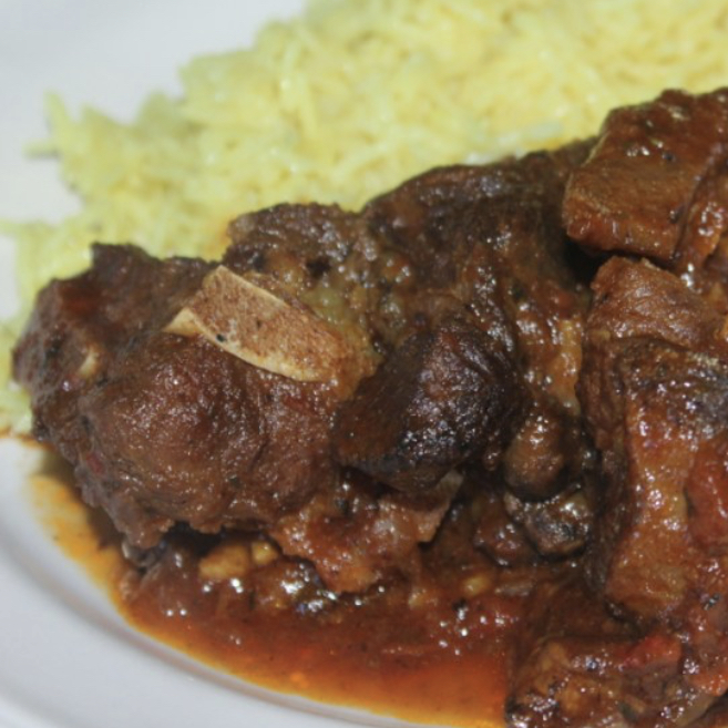 Order Goat Stew food online from Mi barrio store, Charlotte on bringmethat.com