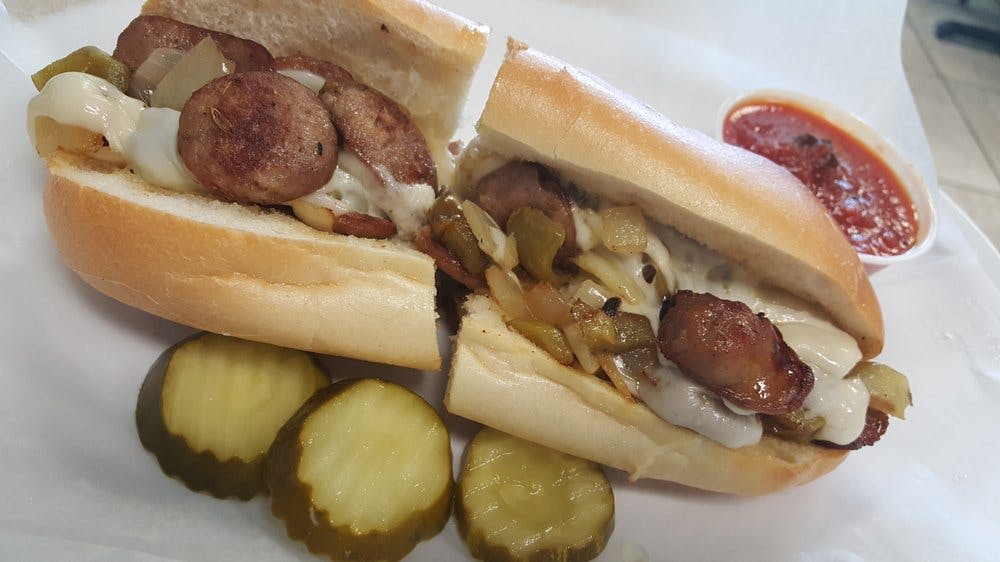 Order Sausage with Peppers & Onion Hot Sandwich - Sandwich food online from Tony Soprano's Pizza store, Turnersville on bringmethat.com
