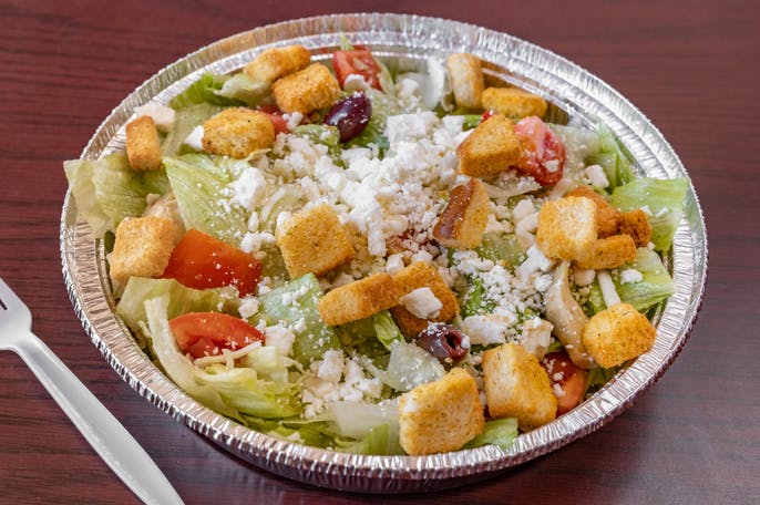 Order 12" Greek Salad food online from LA Pizza store, Victorville on bringmethat.com