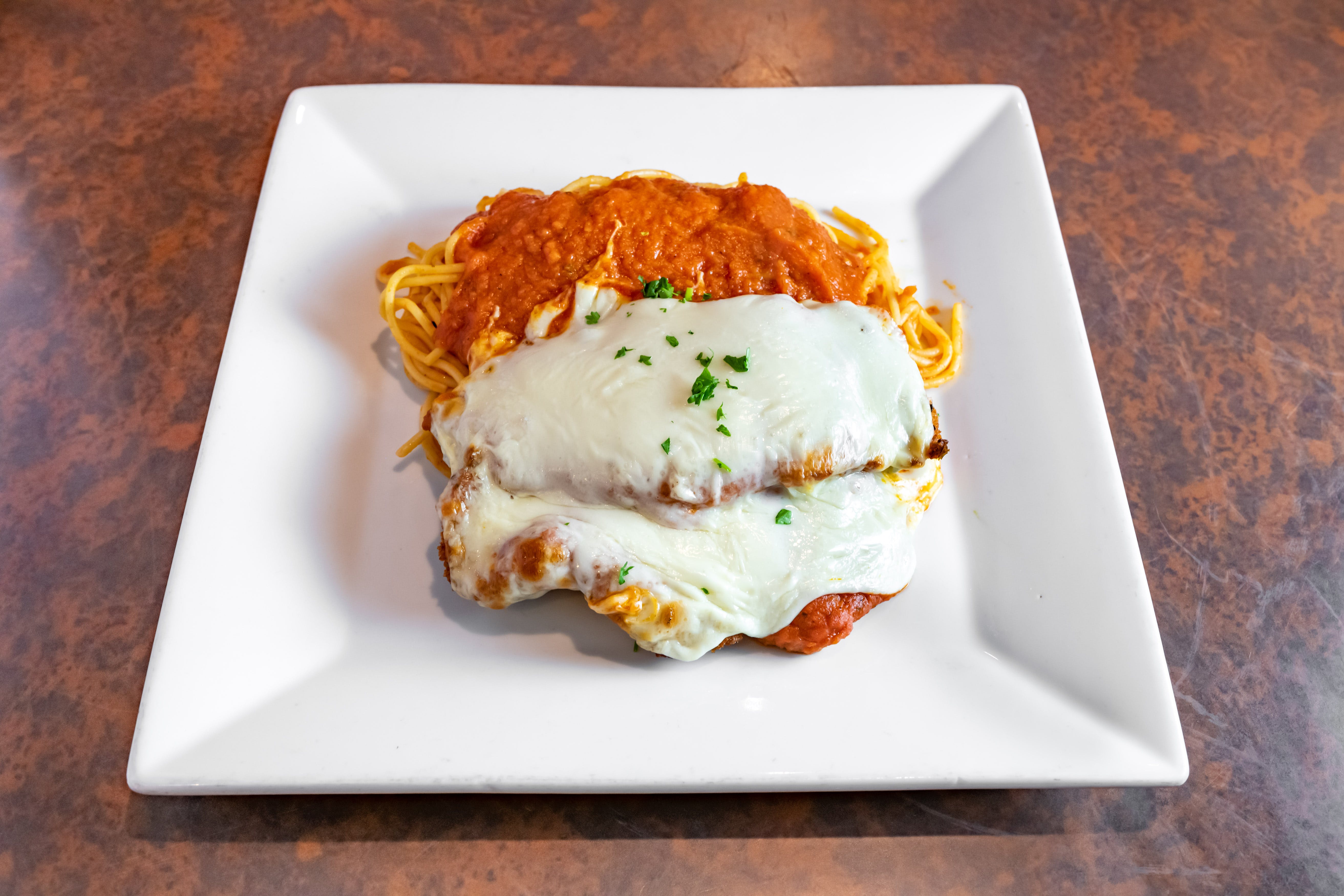 Order Chicken Parmigiana - Entree food online from Paisano's store, Benbrook on bringmethat.com