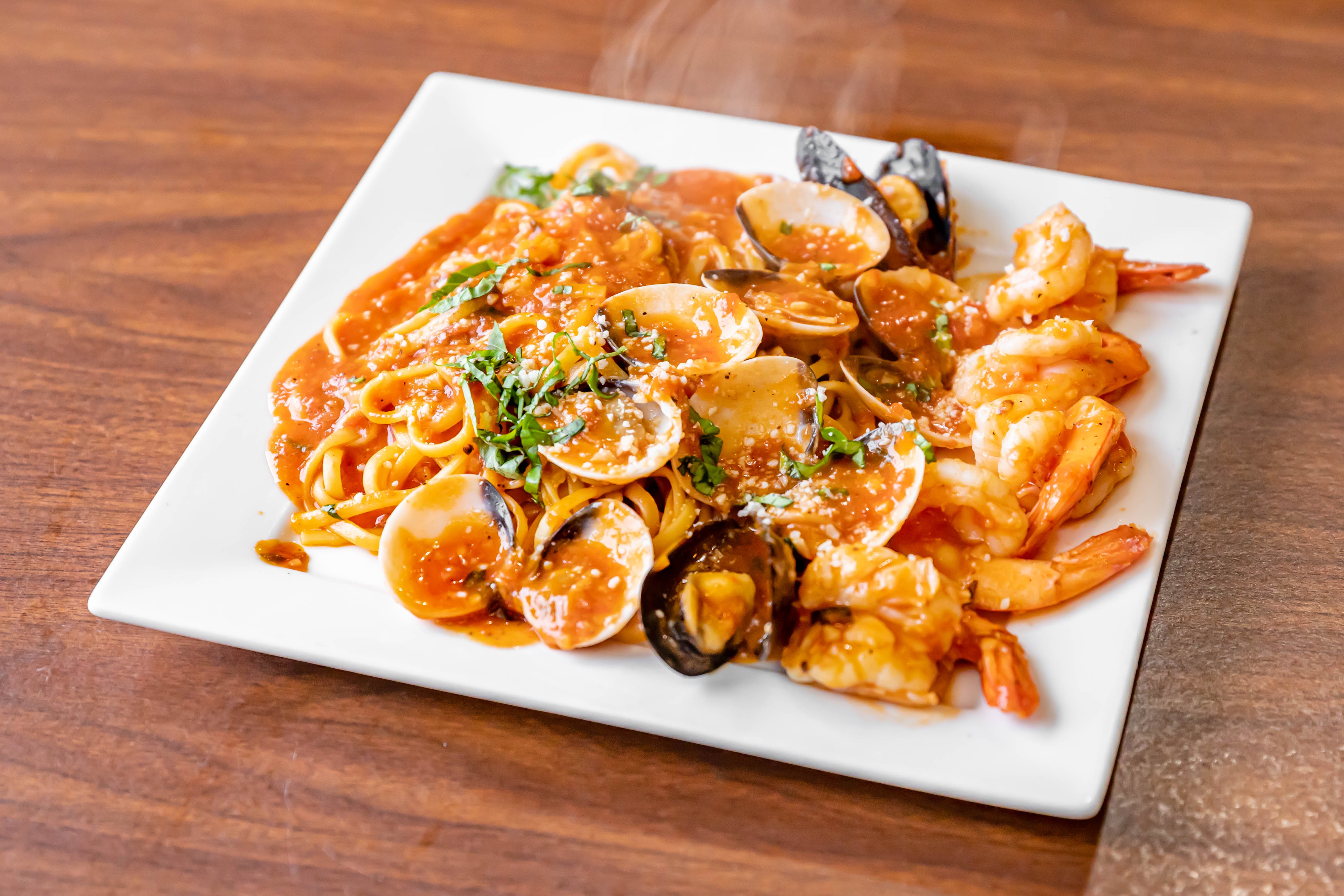 Order Seafood Combo - Entree food online from Jack Pizzeria store, Phillipsburg on bringmethat.com