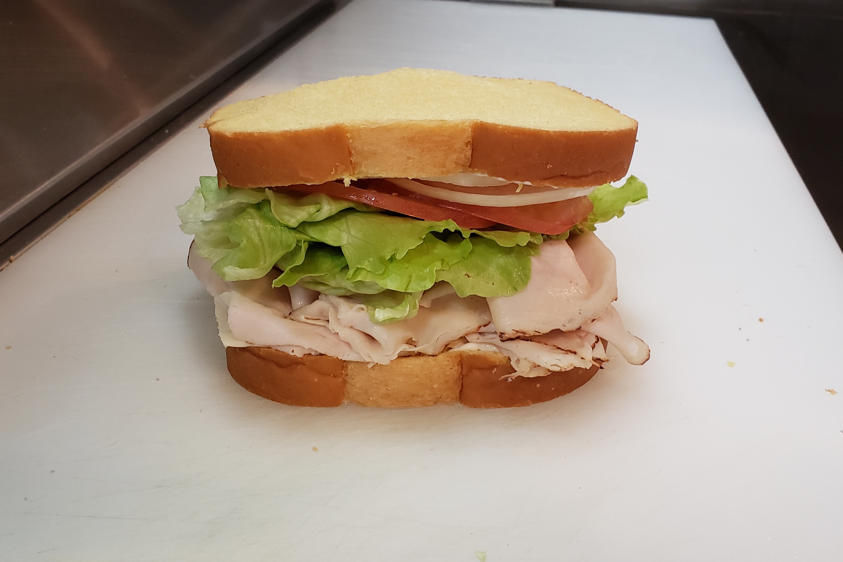 Order Turkey & Cheese sandwich food online from Knj Convenience Store& Deli store, Melrose Park on bringmethat.com