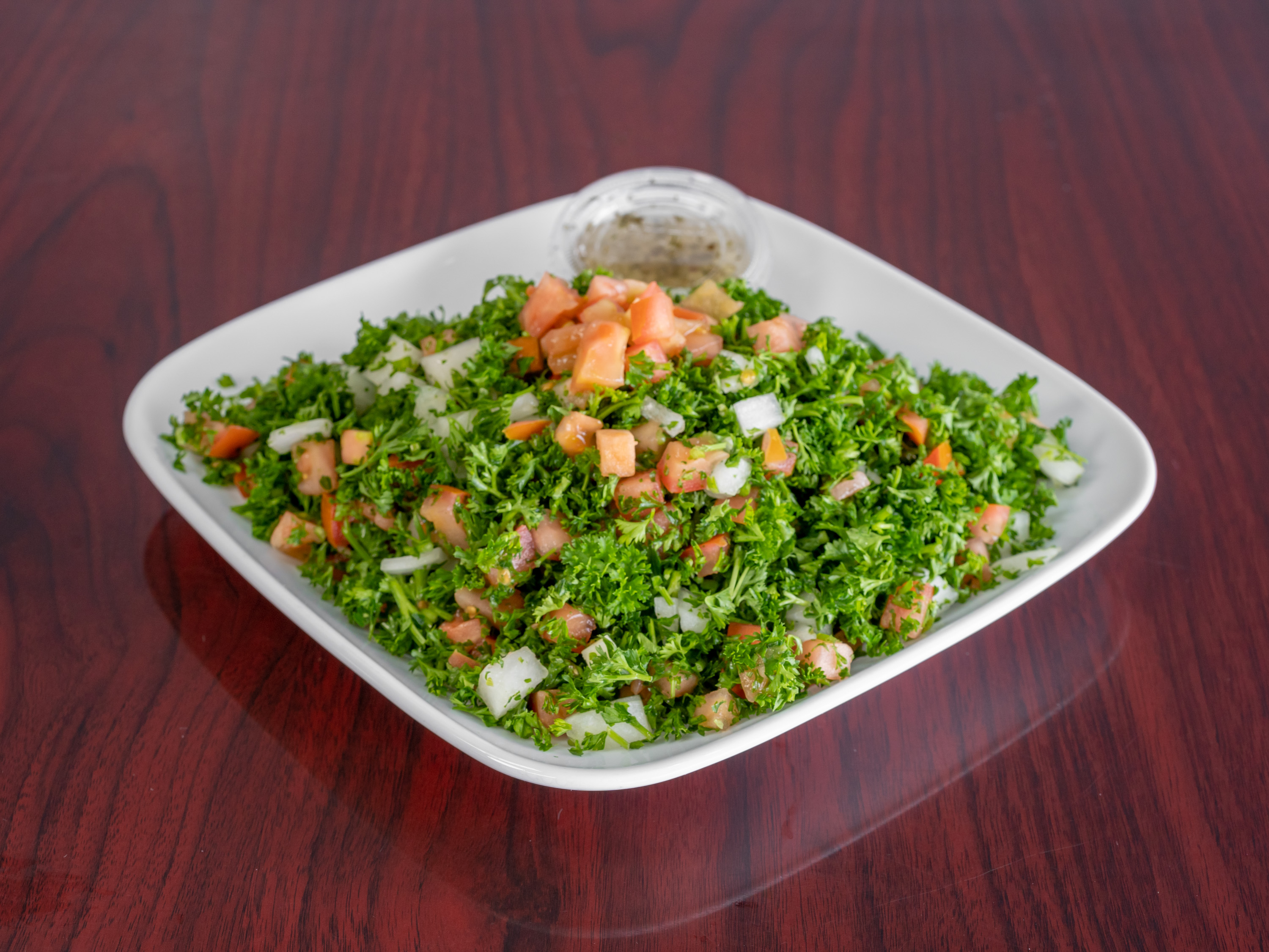 Order Tabbouli Salad food online from Kabob Grill store, Shelby Charter Township on bringmethat.com