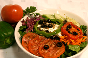 Order Greek Salad food online from Epicure Cafe store, Houston on bringmethat.com