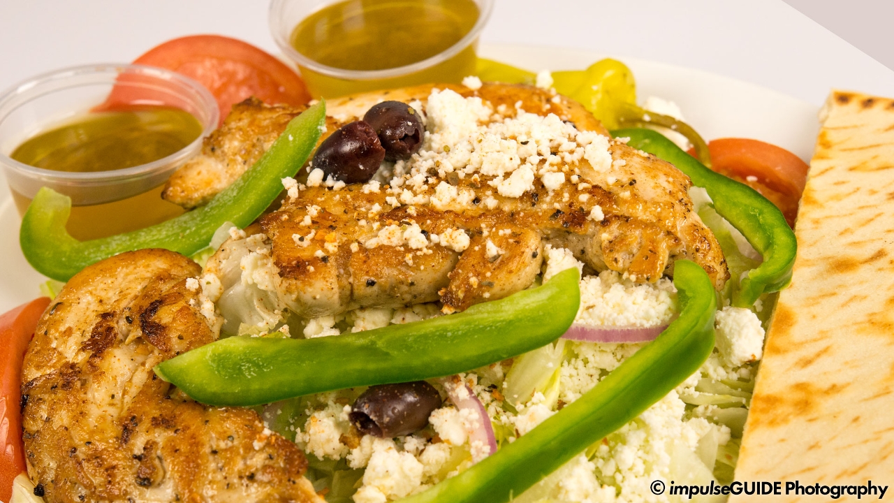 Order Grecian Salad food online from Louie's Texas Red Hots store, Buffalo on bringmethat.com