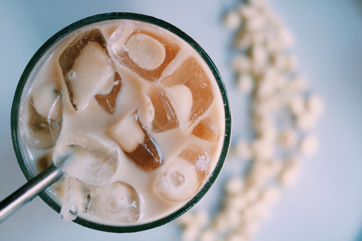 Order 16 oz. Iced White Mocha Latte food online from CupLux Coffee Drive-Thru store, Charlotte on bringmethat.com