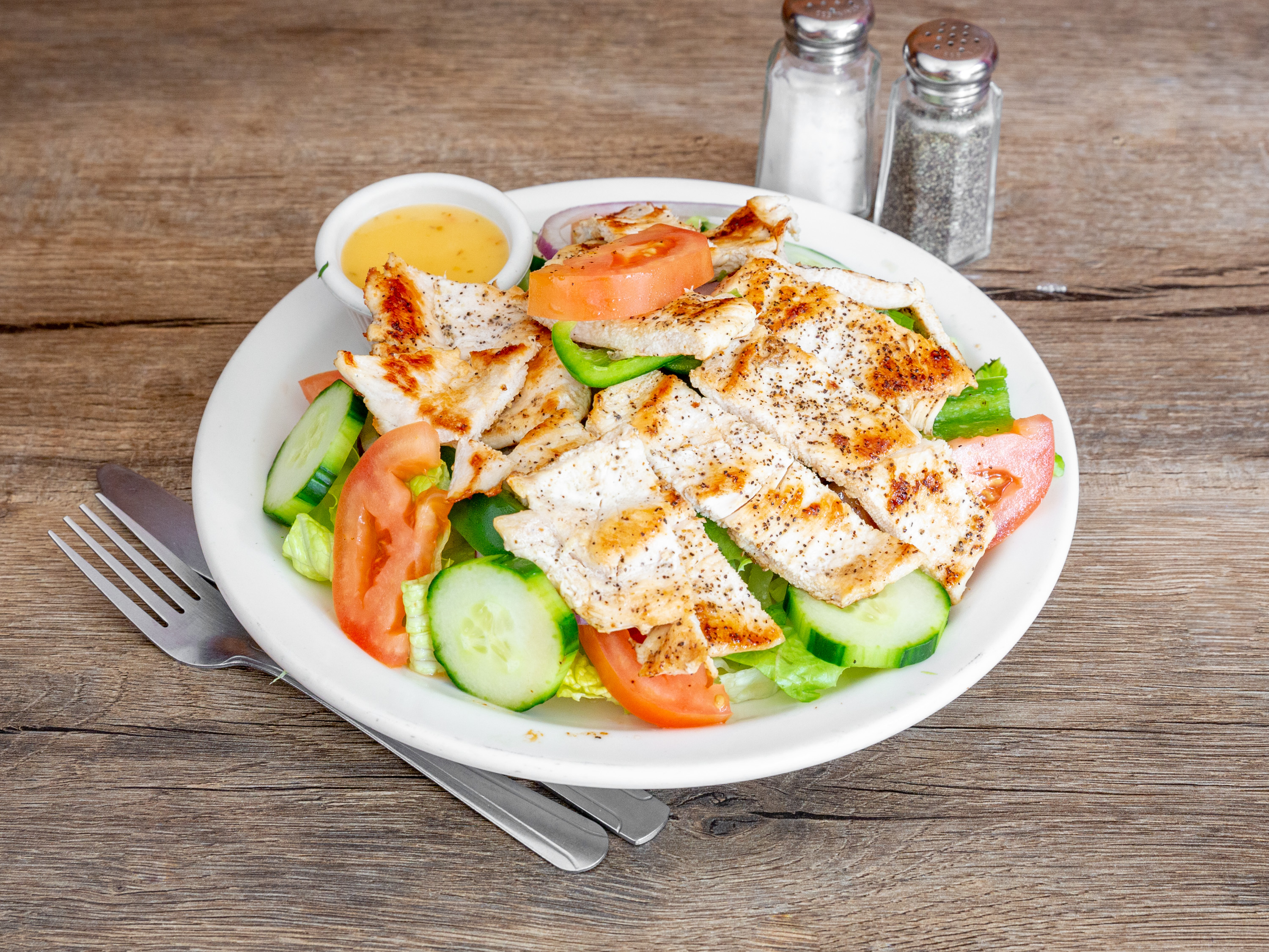 Order Greek Salad food online from Alondra's Cuisine store, Middletown on bringmethat.com