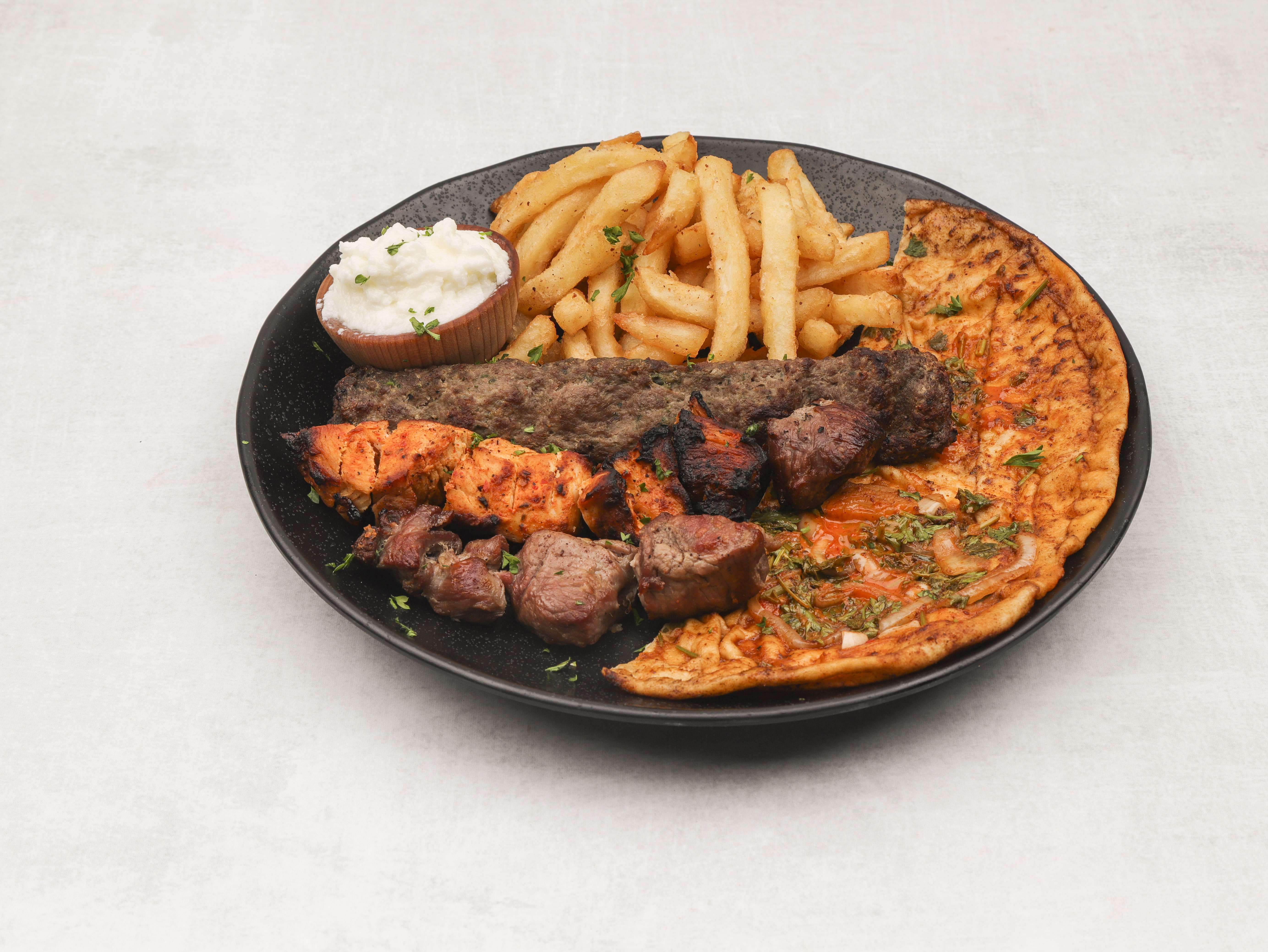 Order Mix Grill food online from Majeed Mediterranean Restaurant store, Saint Louis on bringmethat.com