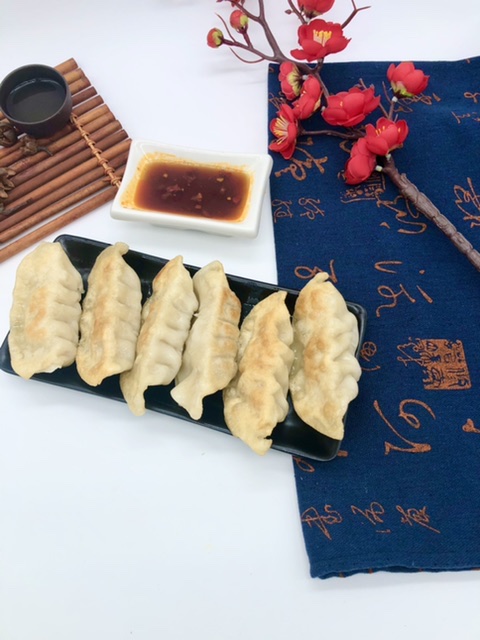 Order 10. Fried Potsticker food online from Red Bowl store, Grand Rapids on bringmethat.com