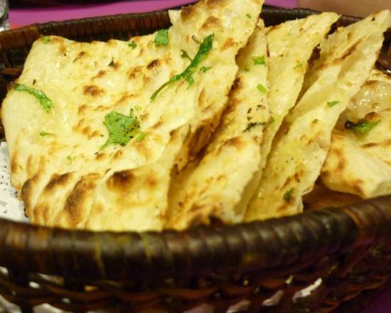 Order Butter Naan food online from Paradise Indian Cuisine store, Manchester on bringmethat.com