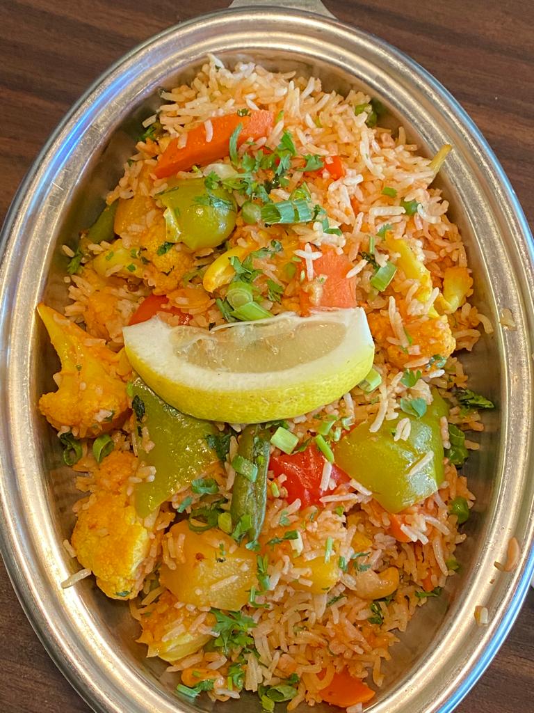 Order Vegetable Biryani food online from India Bistro store, Seattle on bringmethat.com