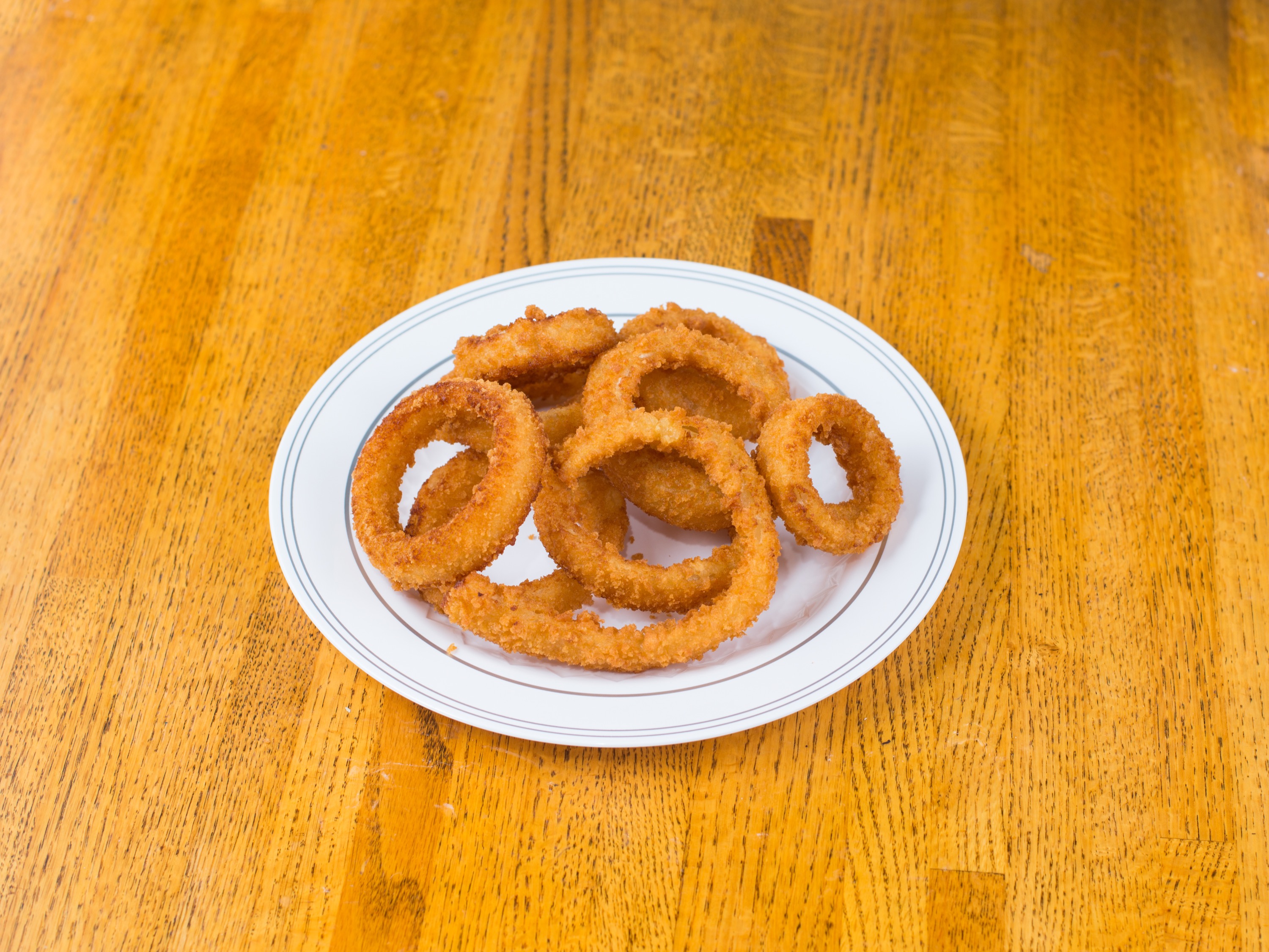 Order Breaded Onion Rings food online from Russell Barbecue store, Countryside on bringmethat.com