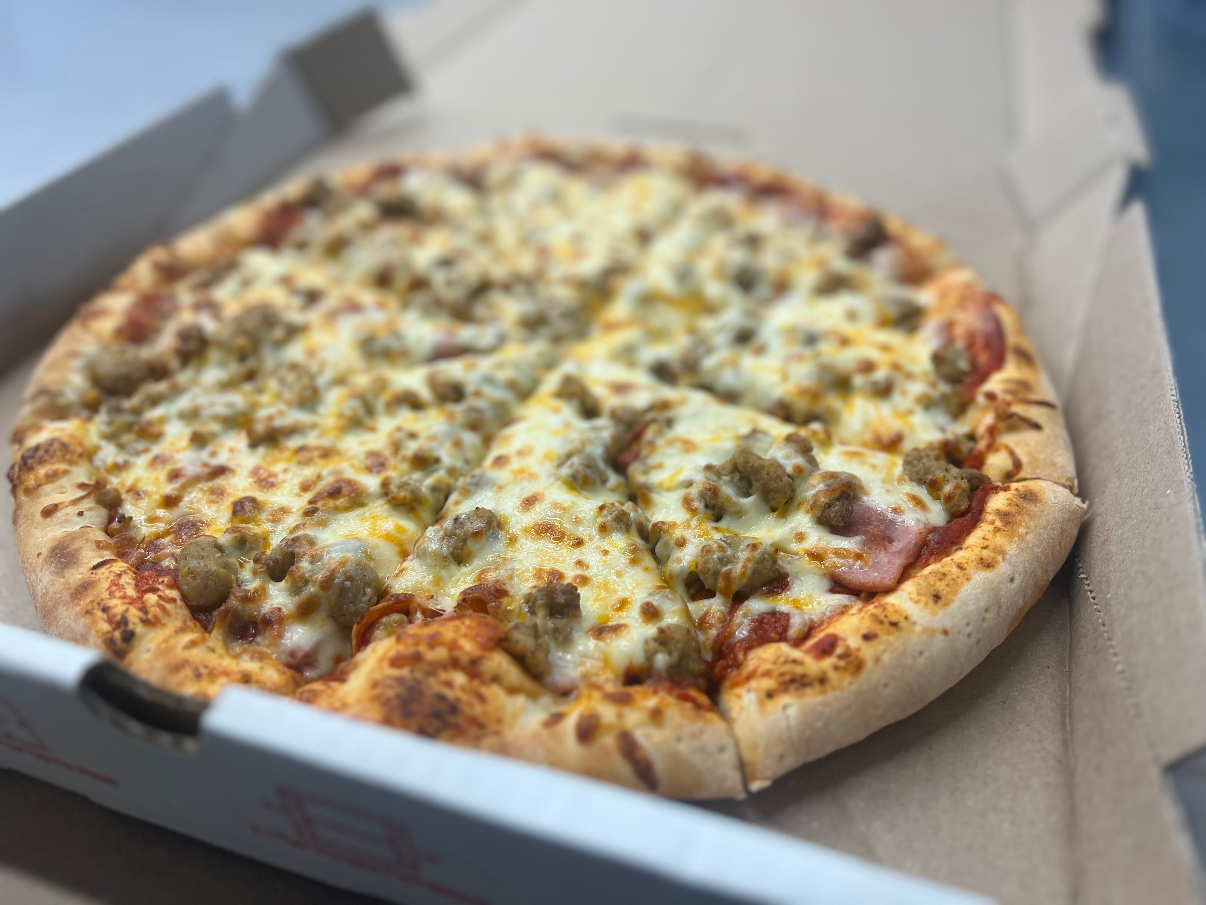 Order Meat Lover's Pizza - Small 10'' food online from Jimmy's Pizza Litchfield store, Litchfield on bringmethat.com
