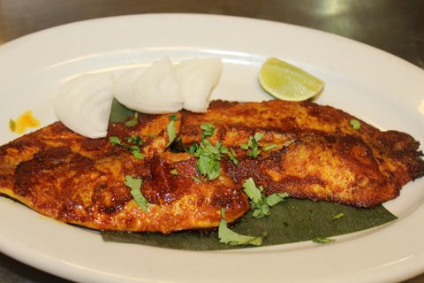 Order Pan seared Tilapia Fillet and potatoes  food online from Southern Spice store, New Hyde Park on bringmethat.com