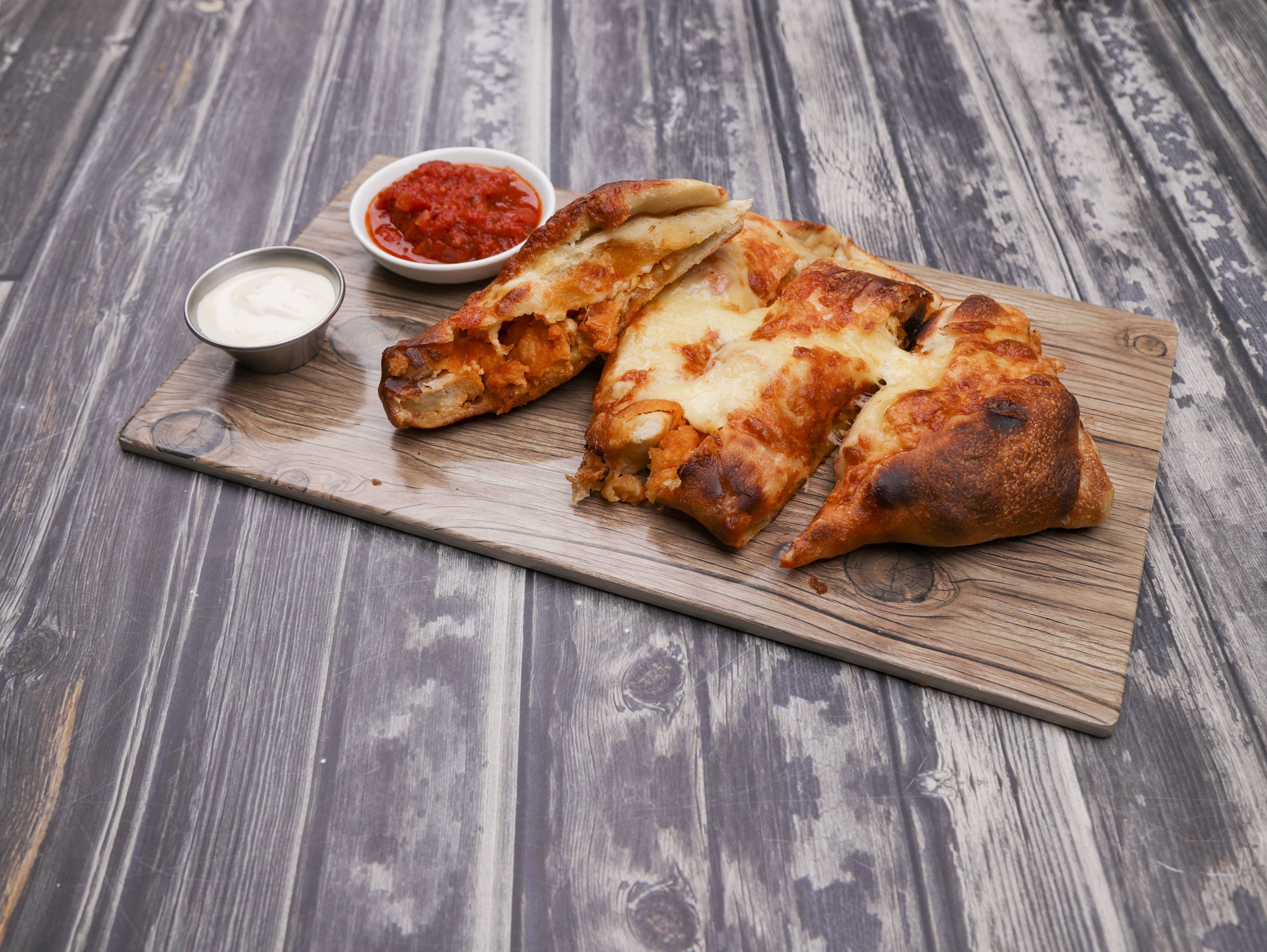 Order Buffalo Chicken Calzone food online from Primo Pizza & Roast Beef store, Lynn on bringmethat.com