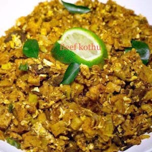 Order Veggie Kothu food online from Mithu Indian Cuisine store, Grand Rapids on bringmethat.com
