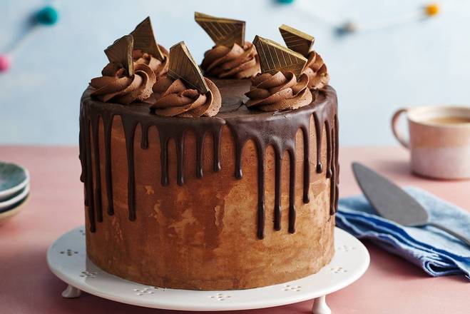 Order NEW 4" Whole Chocolate Buttercream Cake food online from Valbella Midtown store, New York on bringmethat.com