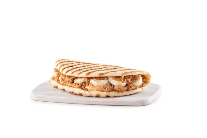 Order PEANUT BUTTER BANANA CRUNCH FLATBREAD food online from Tropical Smoothie Cafe store, University Park on bringmethat.com