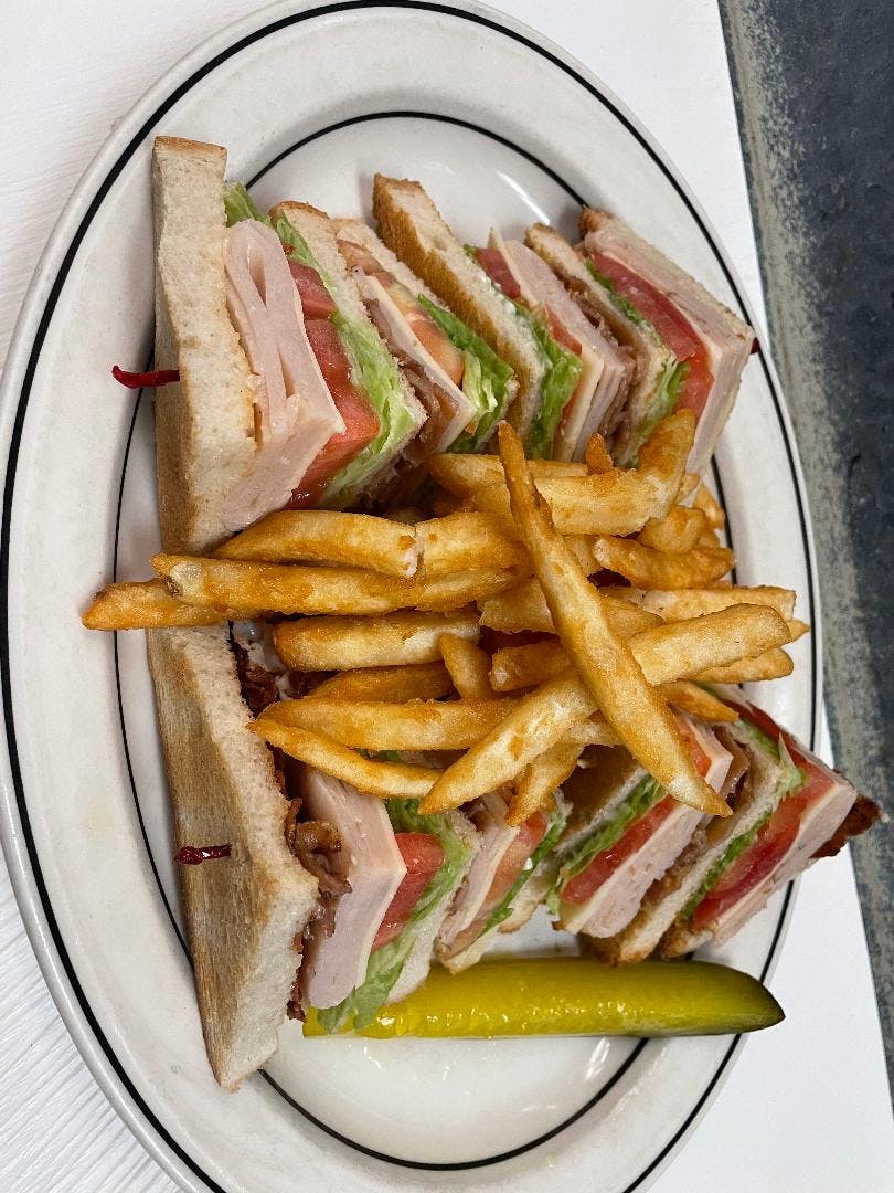 Order Triple Decker Club Sandwich - Sandwich food online from Pan Am Restaurant store, Fairfax on bringmethat.com